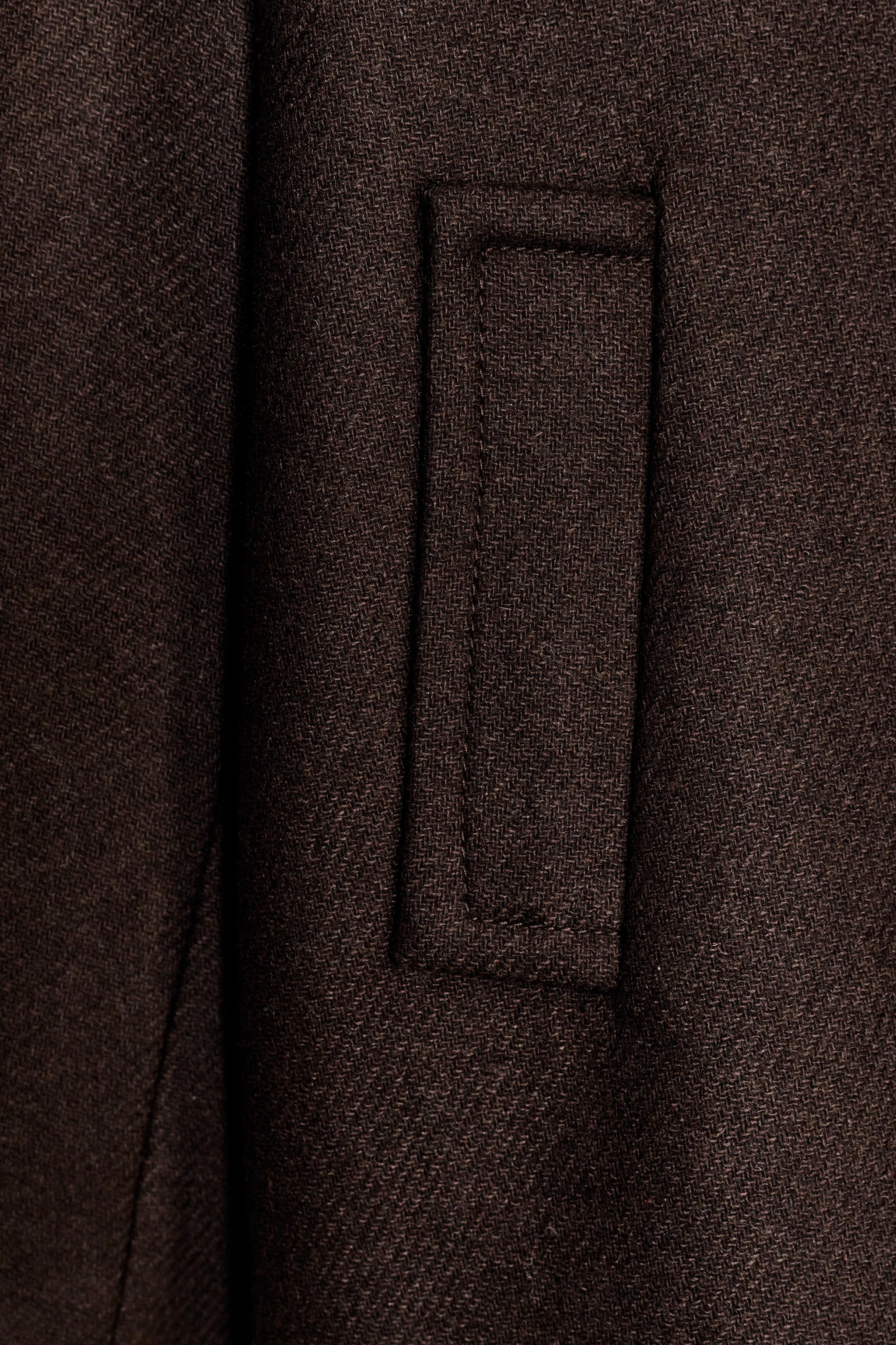 MANTEAU COURT AVEC LAINE ET COL MONTANT
