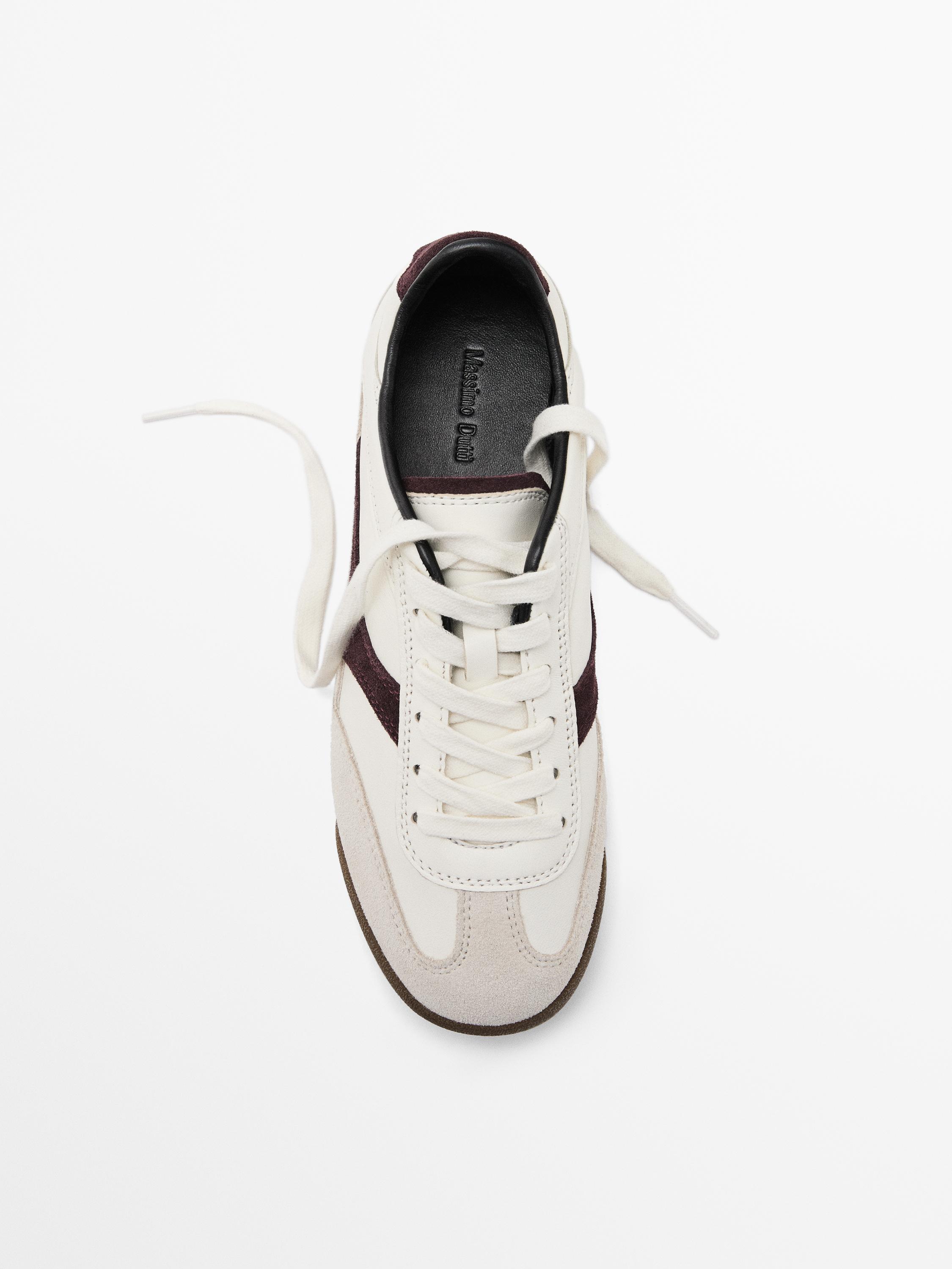 Tennis cuir contrastant