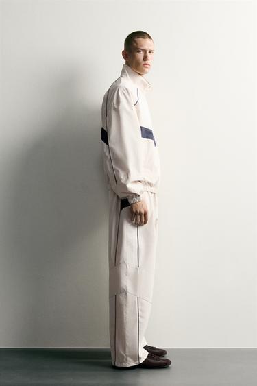 WATER-REPELLENT TECHNICAL CONTRAST TROUSERS - Stone by Zara