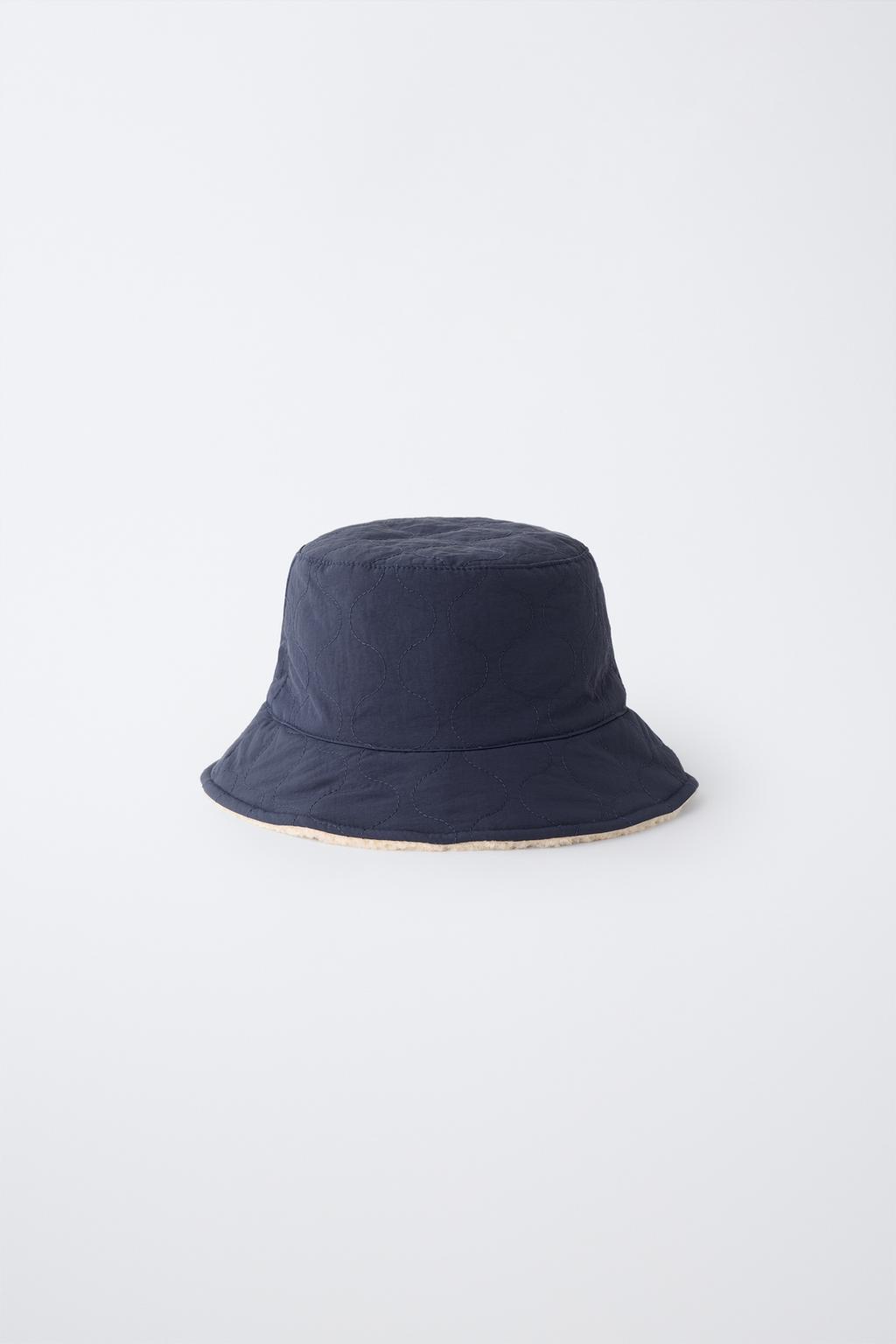 REVERSIBLE NYLON FAUX SHEARLING BUCKET HAT