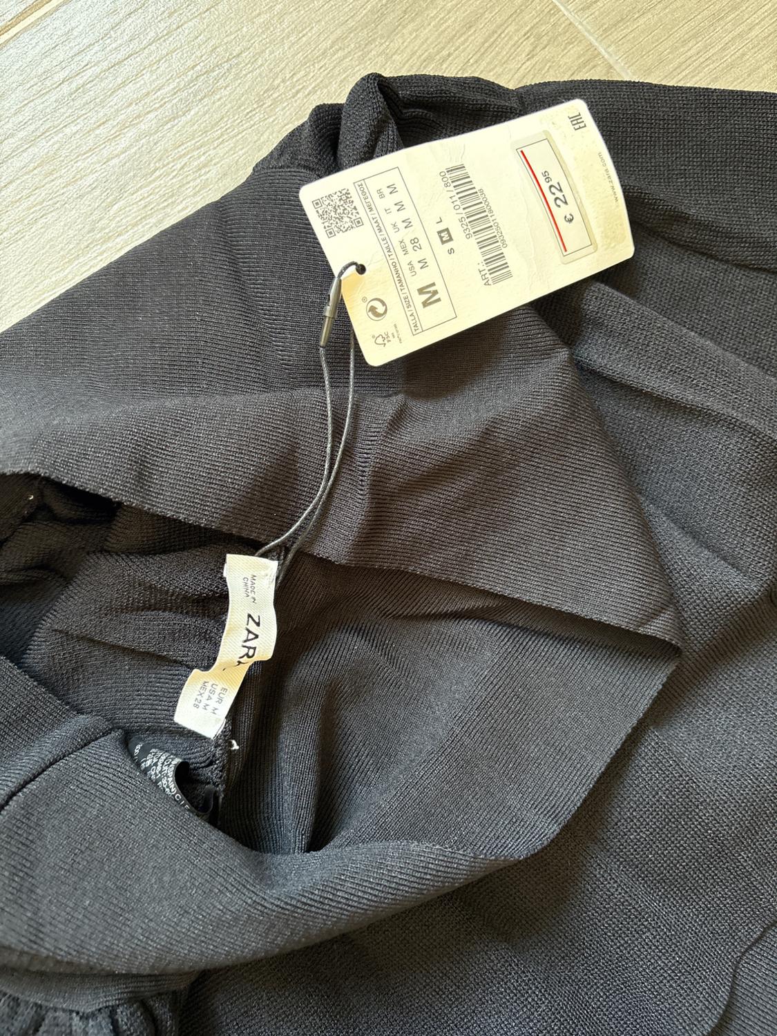 MINI SKIRT WITH CORDS - Image 3