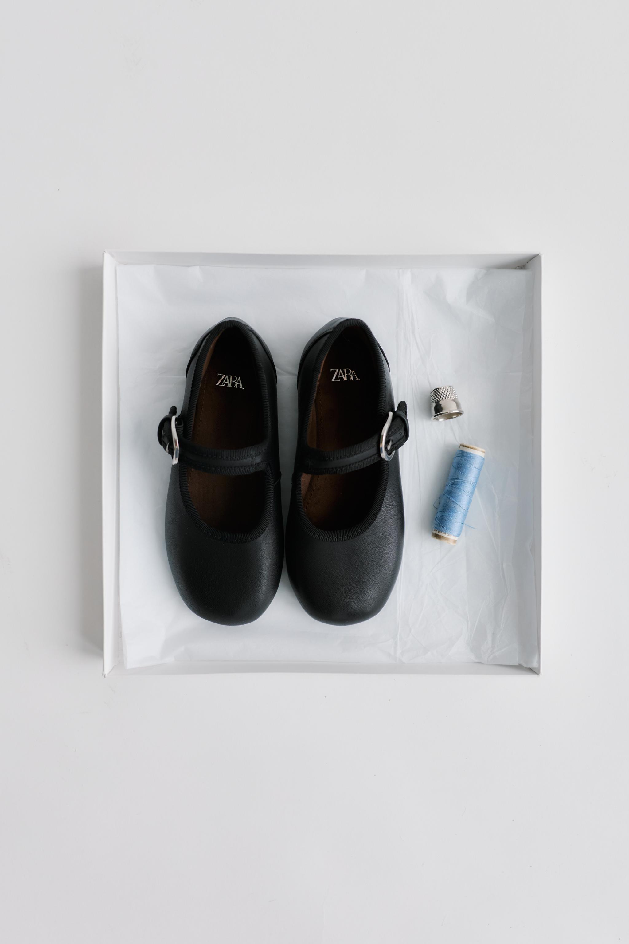 LEATHER BUCKLE BALLET FLATS — Black