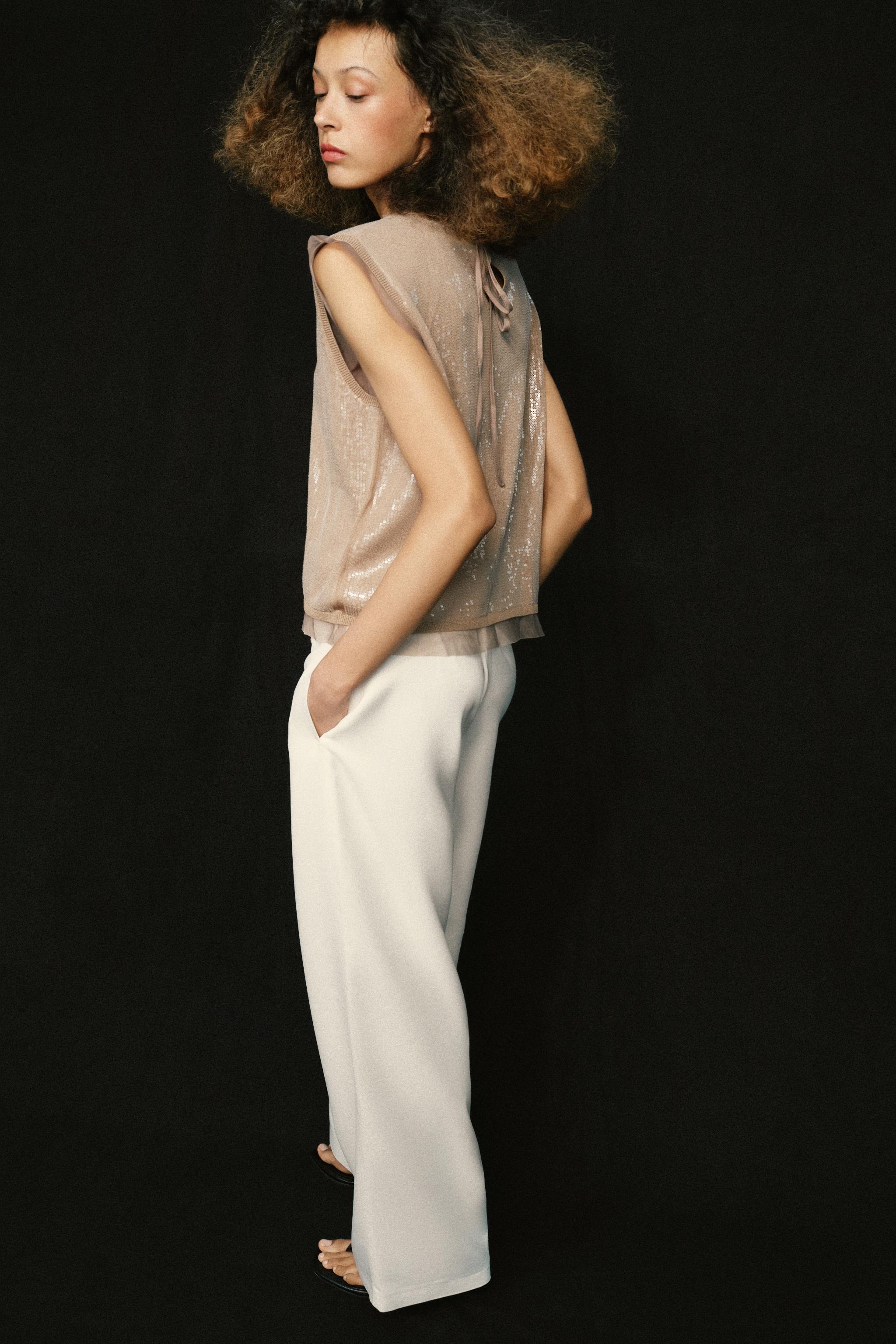 TOP EN MAILLE ET PAILLETTES