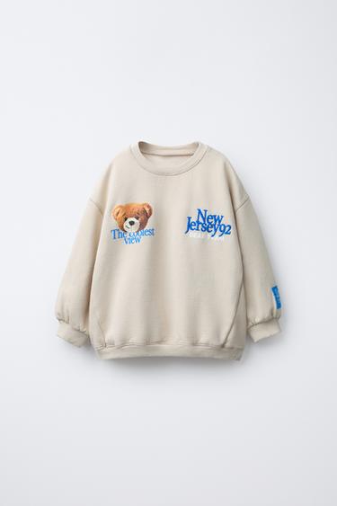 SWEAT-SHIRT IMPRIMÉ OURS ET INSCRIPTION BRODÉE - Beige clair de Zara