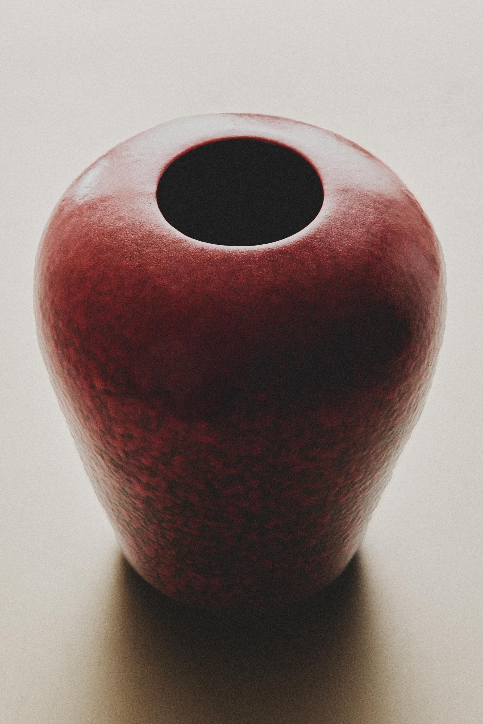 OVAL RED STONEWARE VASE