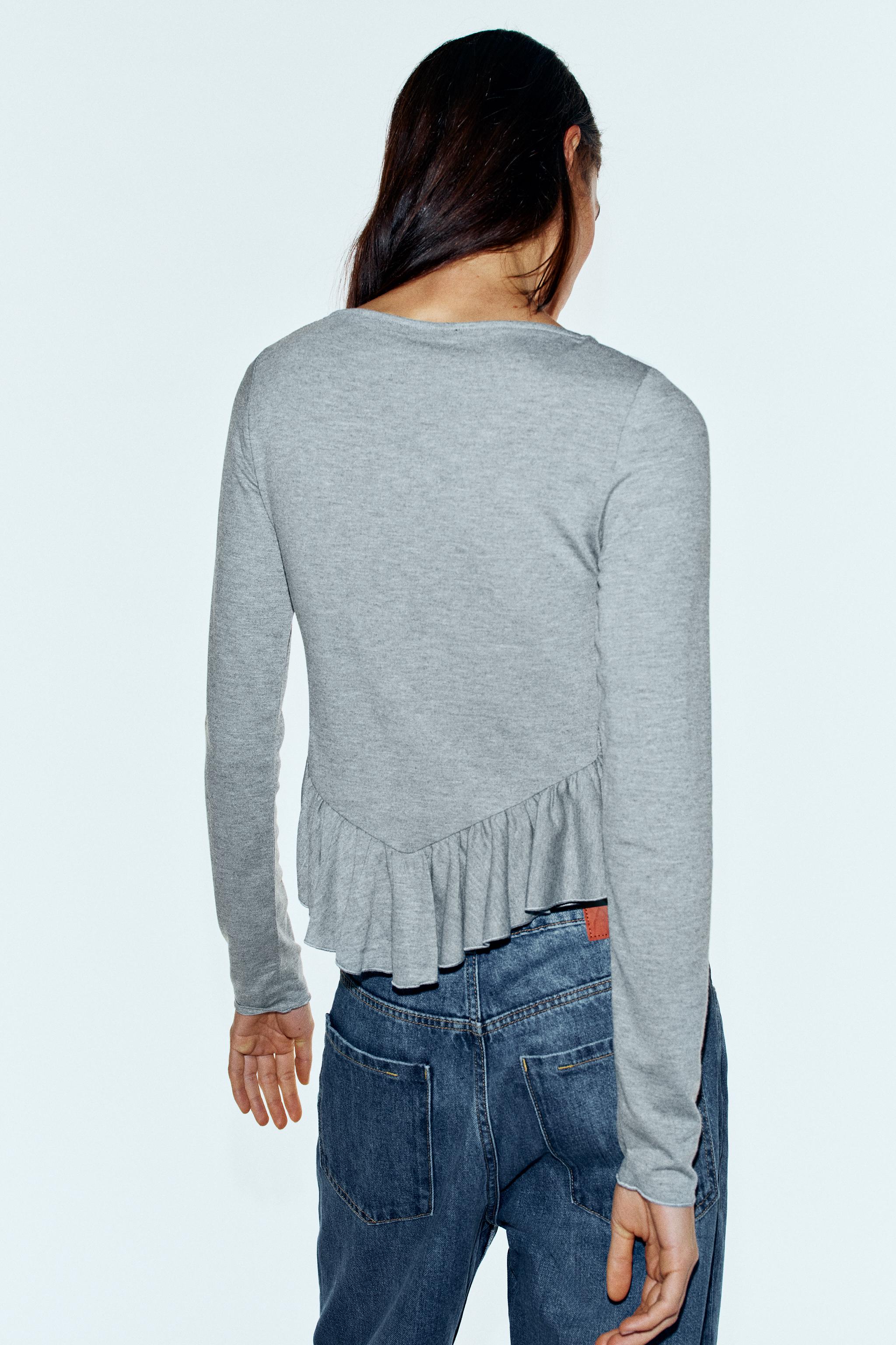 SMOCKED PEPLUM TOP