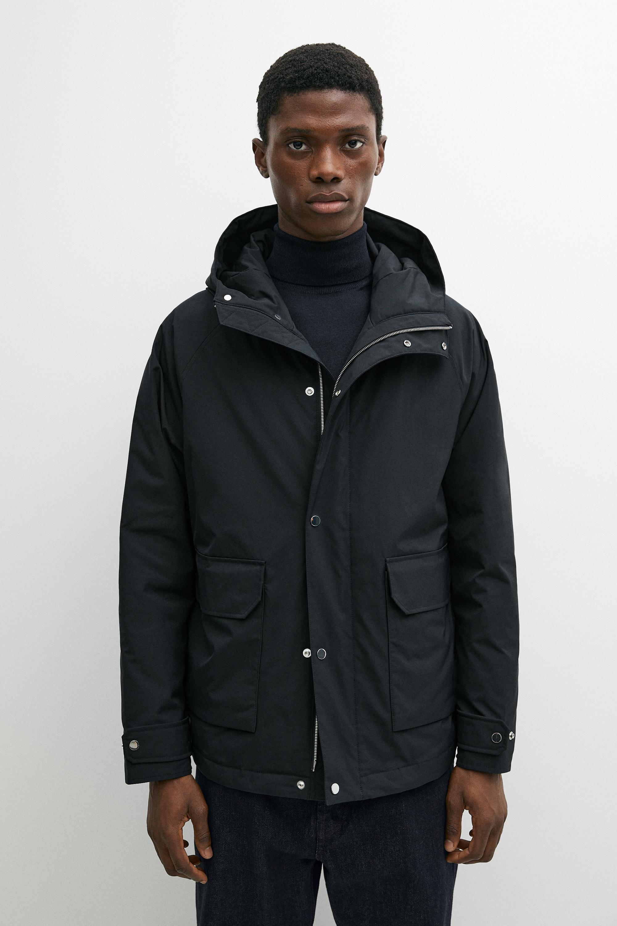 Short quilted parka with pocket details