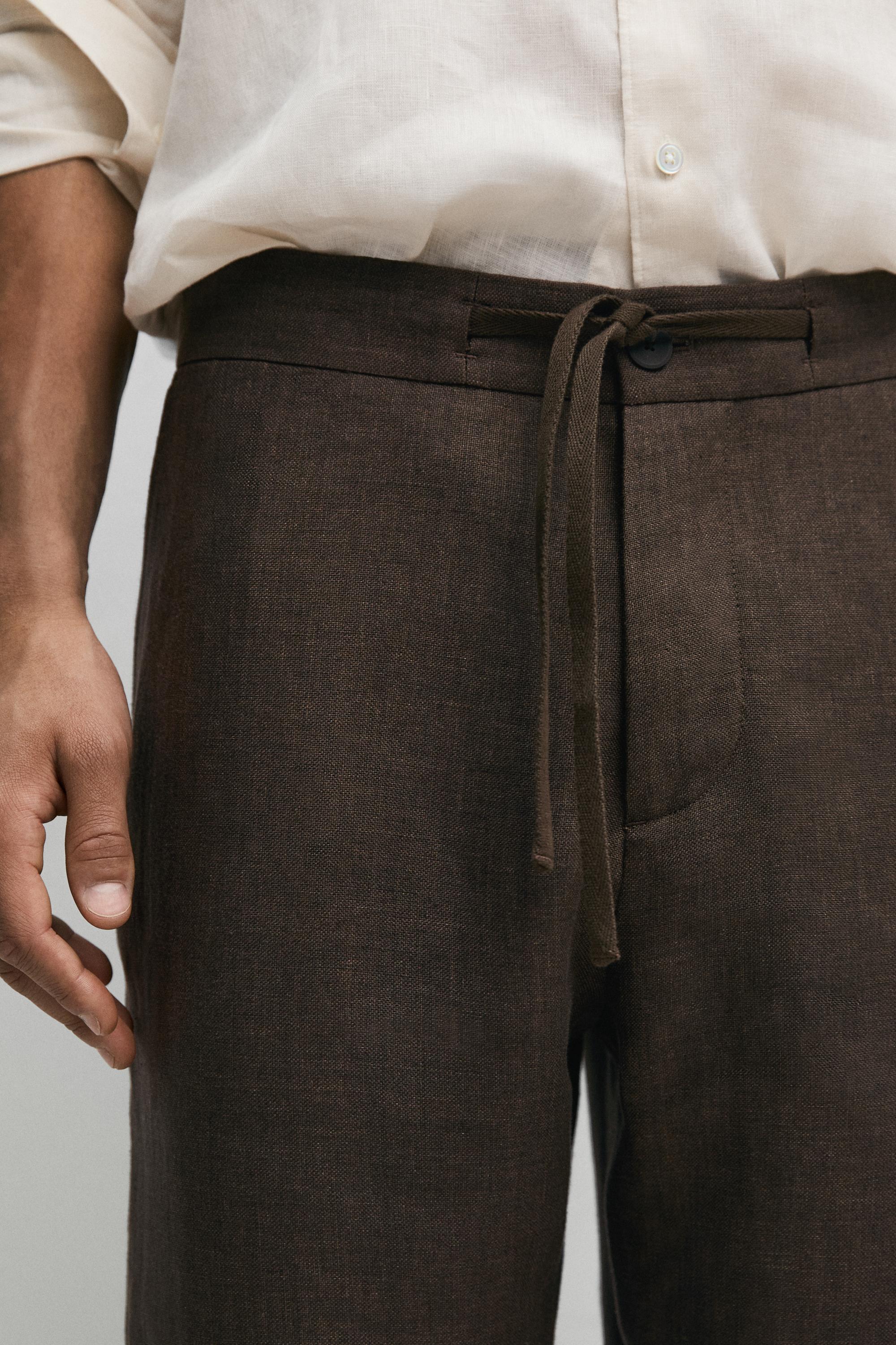 Faded total look linen trousers
