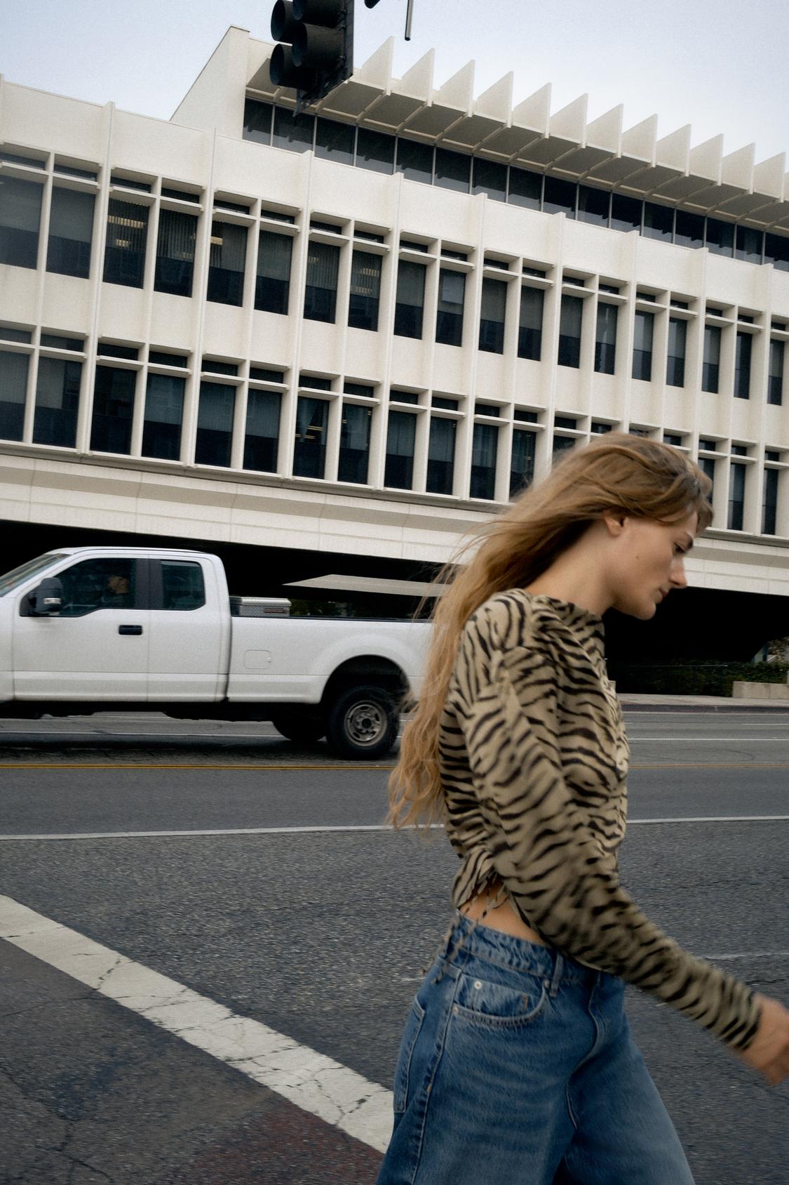 ANIMAL PRINT ASYMMETRIC TOP