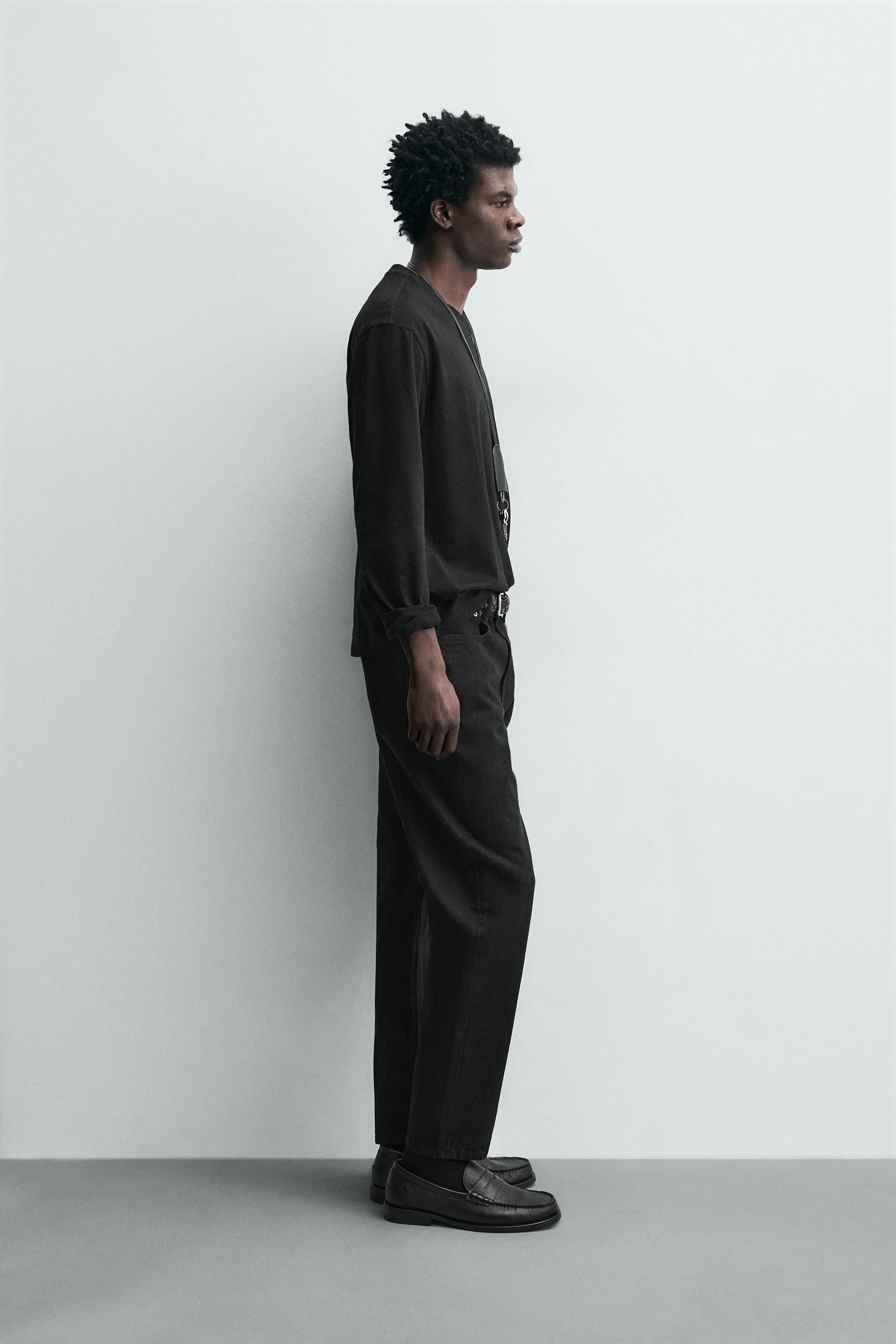SLIM TAPERED FIT JEANS