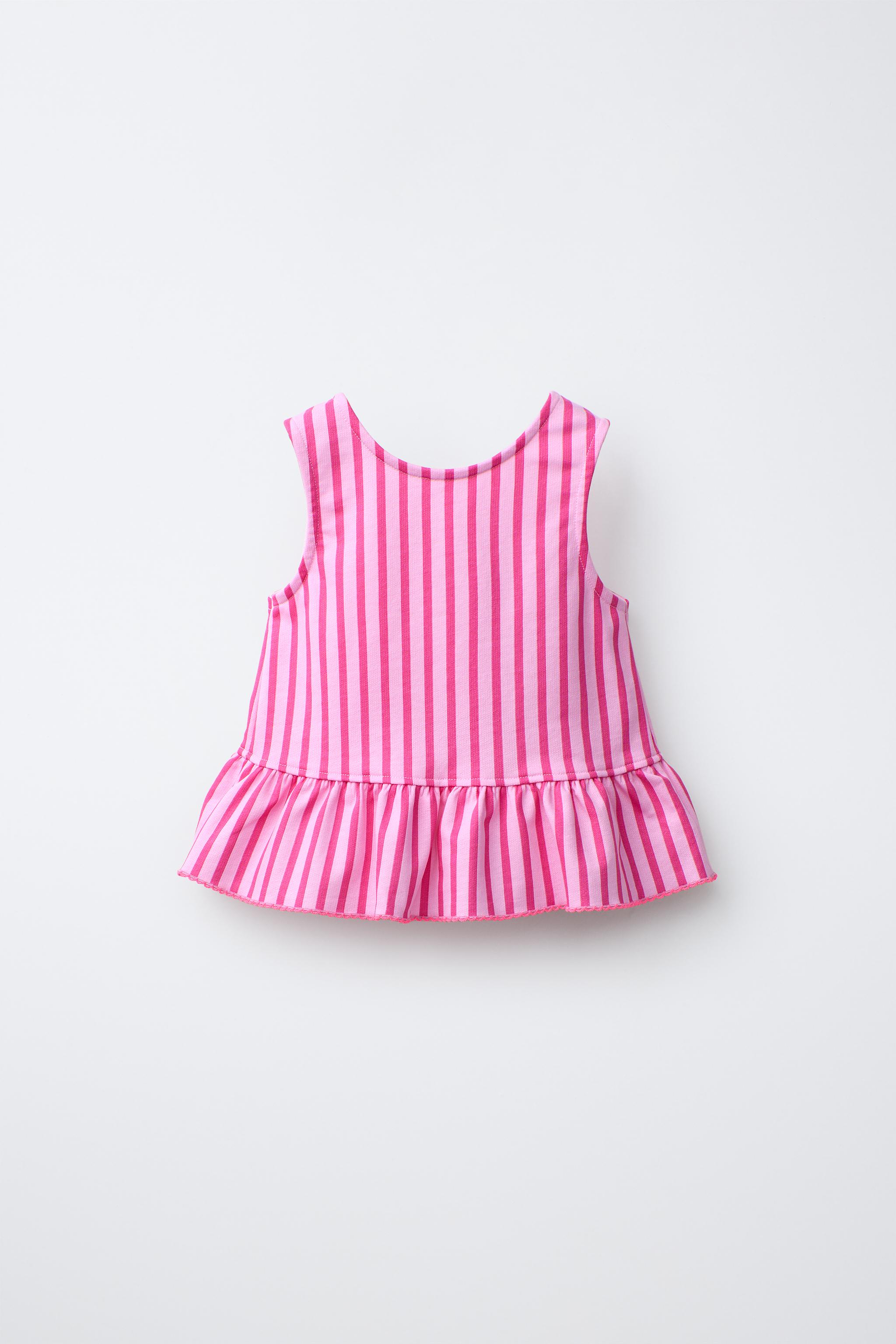 STRIPED PEPLUM TOP WITH CONTRAST LACE