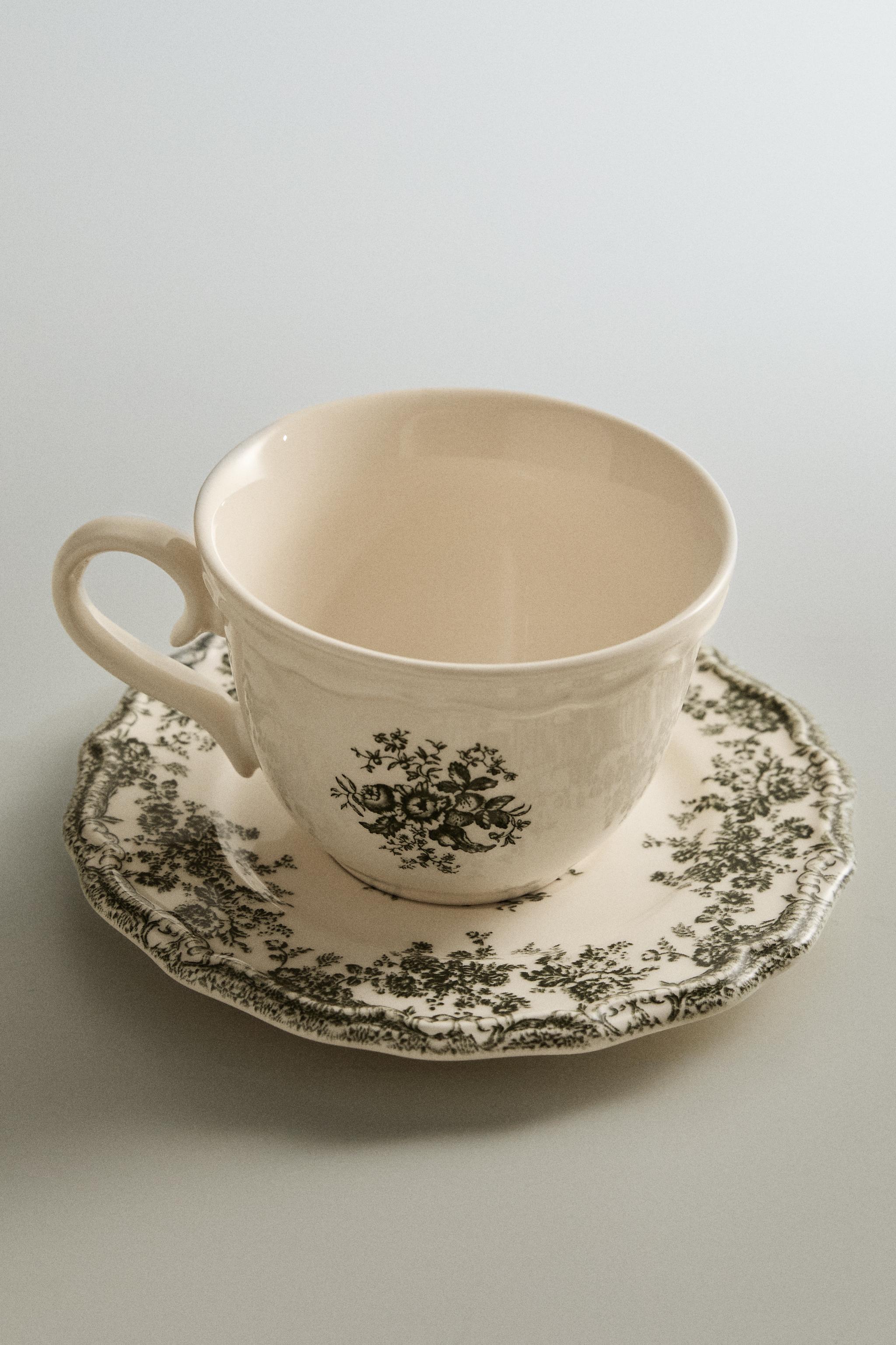 FLORAL TEACUP AND SAUCER