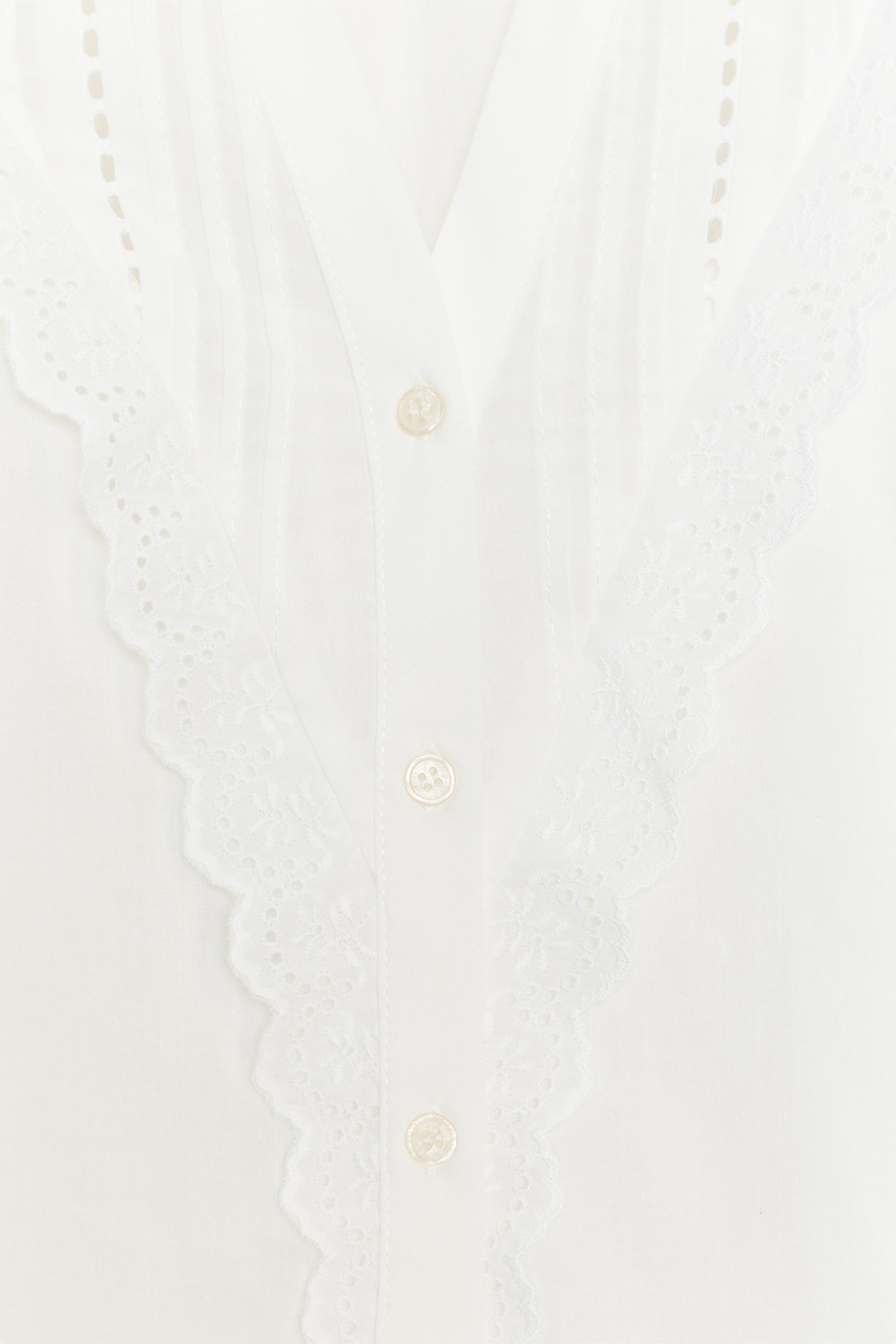 BLOUSE À MANCHES BOUFFANTES