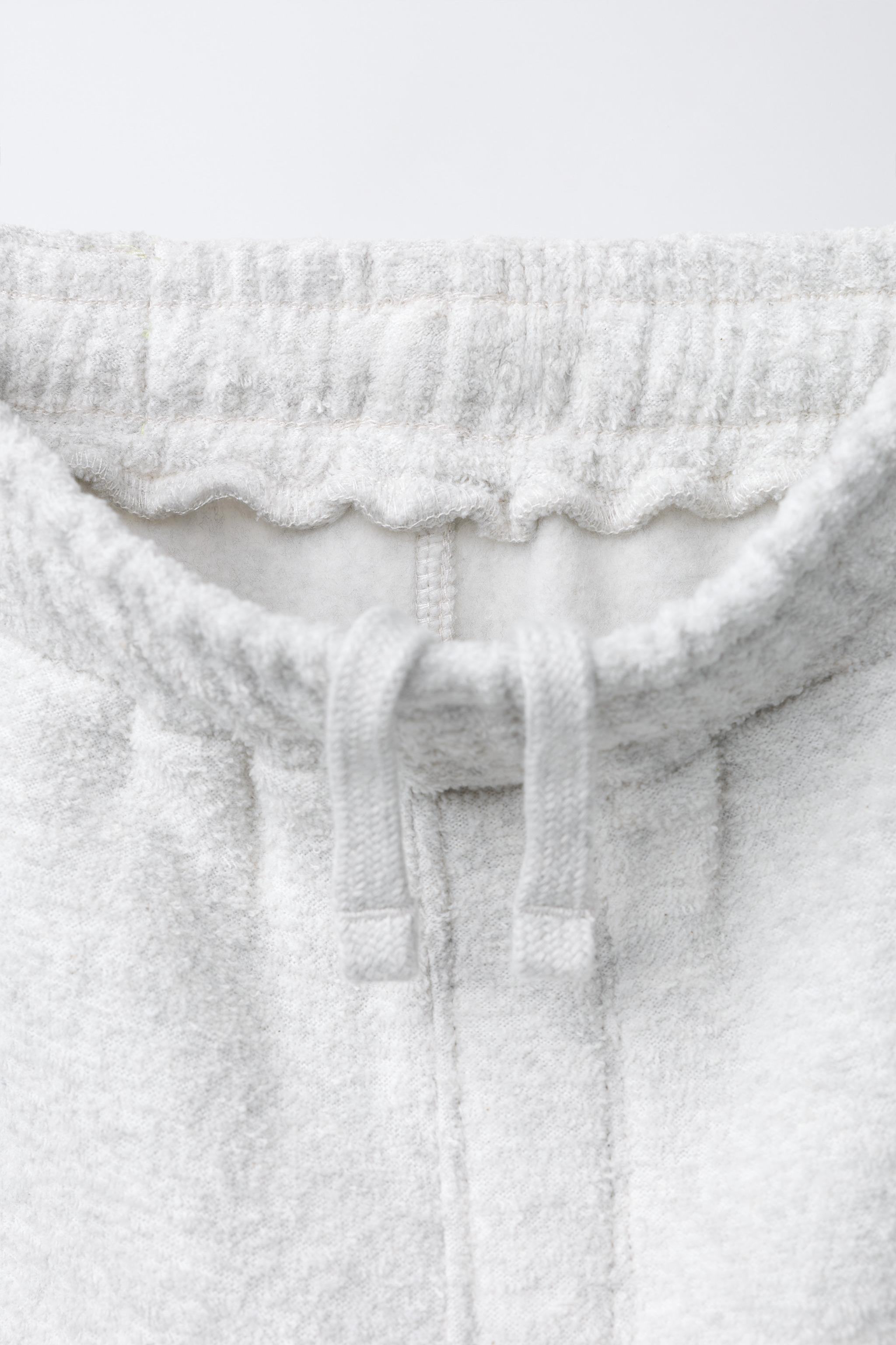 TEXTURED POLO AND WIDE LEG PANTS SET