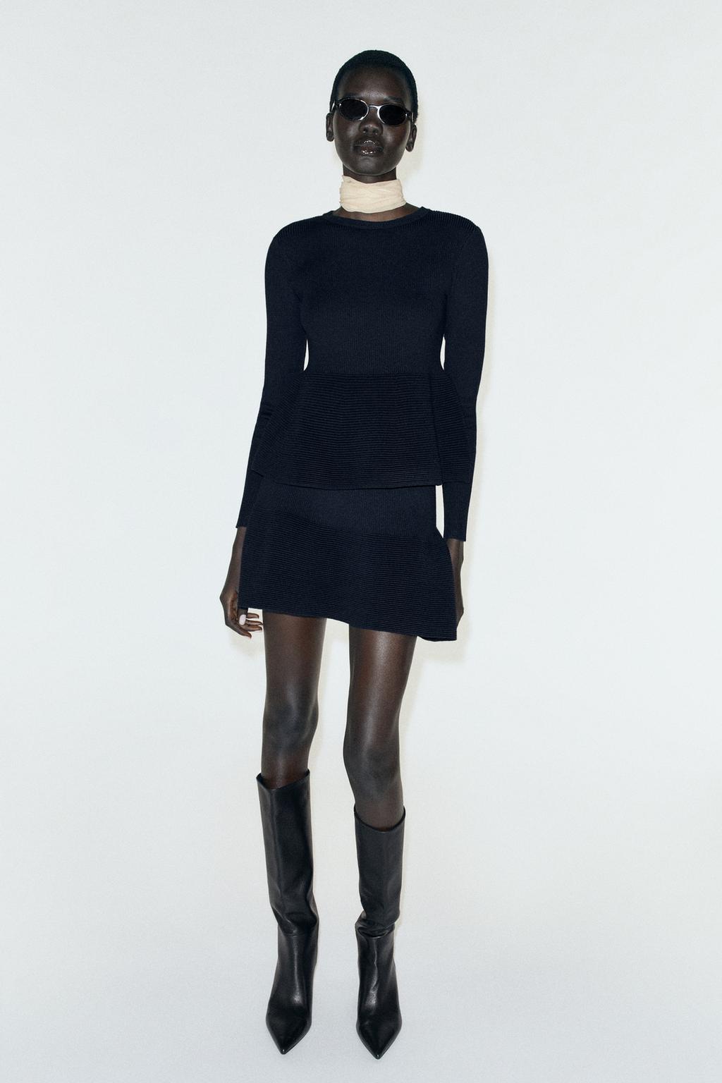 KNIT PEPLUM MINI SKIRT