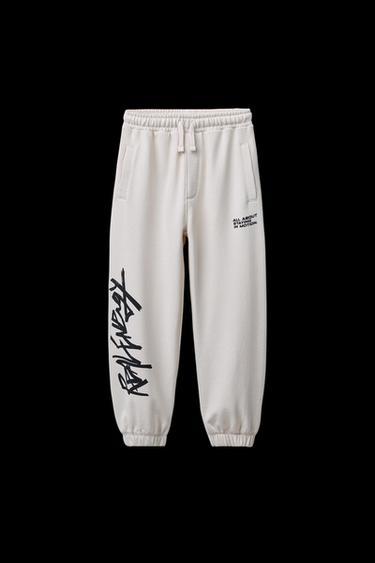 GRAFFITI PRINT JOGGER TROUSERS - Light grey by Zara - Image 0