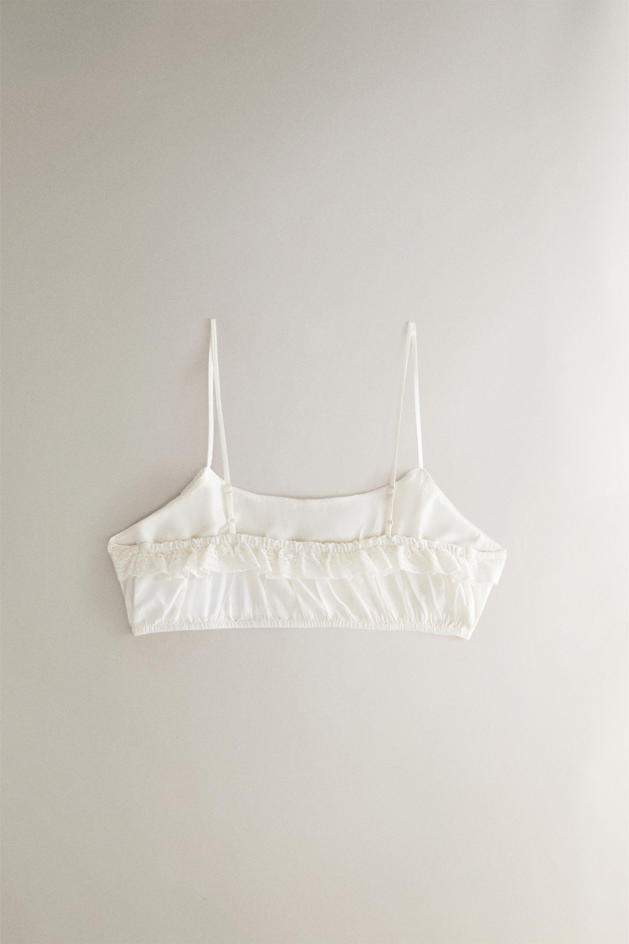 LACE RUFFLE CROP TOP — Ivory
