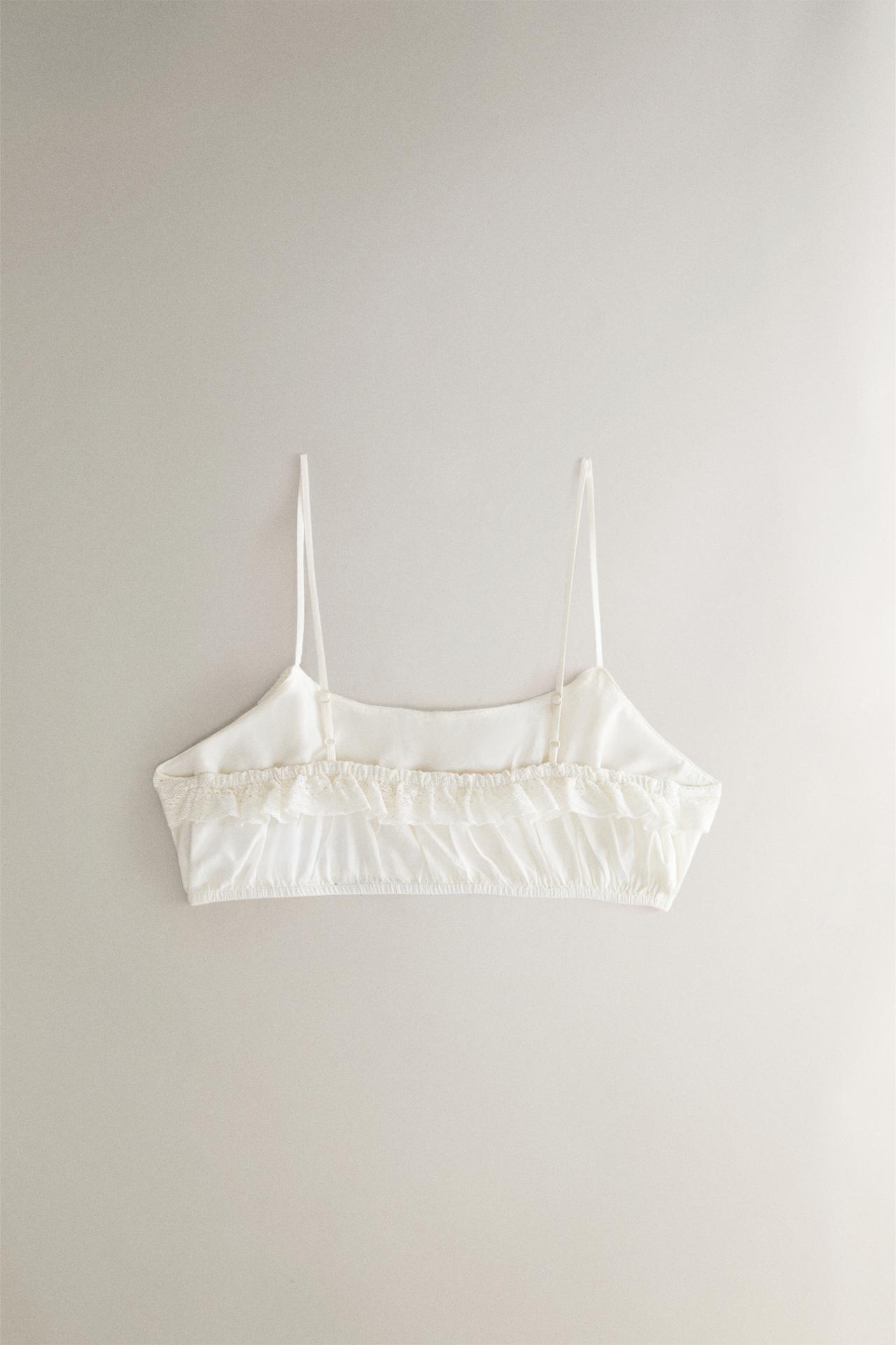 LACE RUFFLE CROP TOP — Ivory