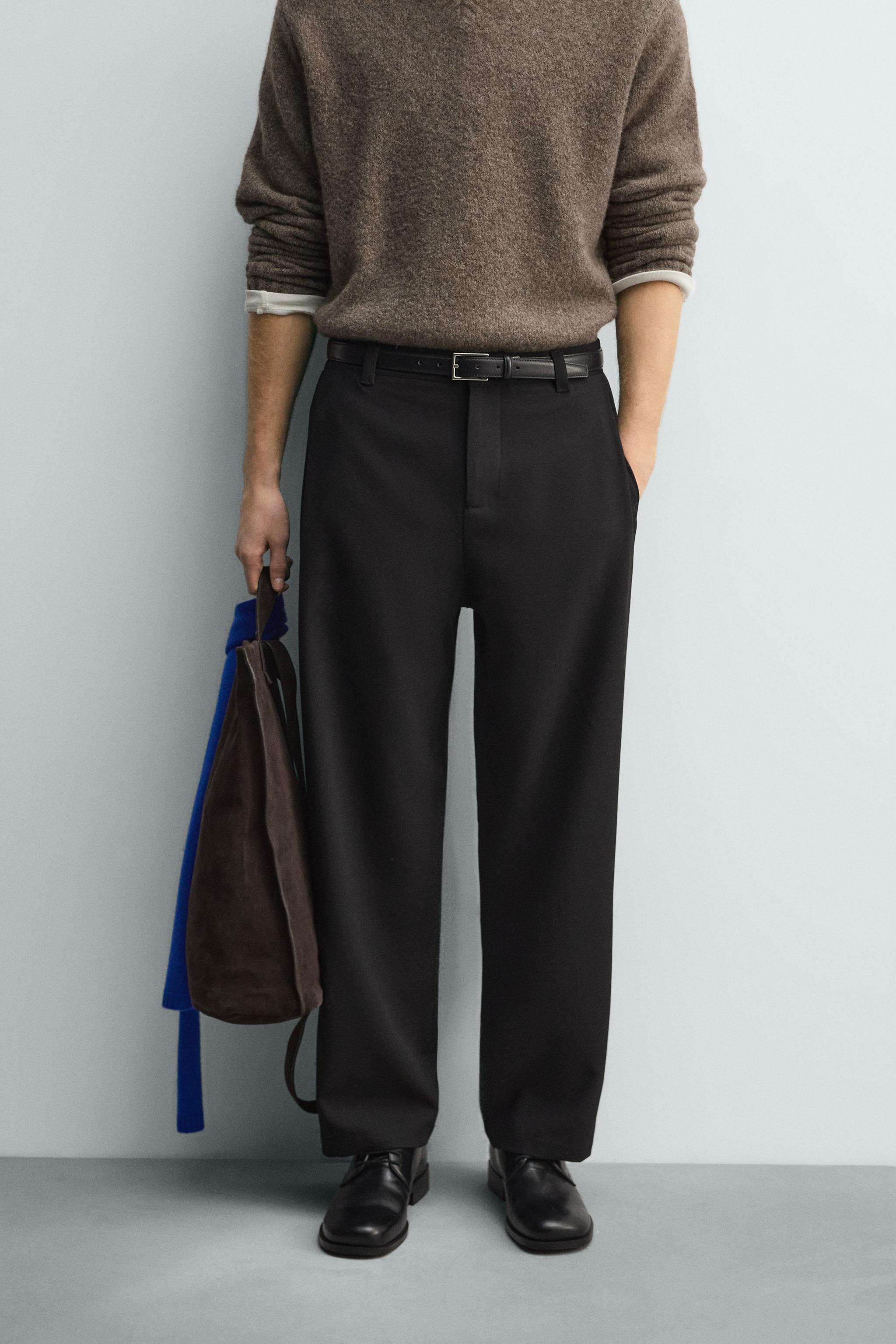 RELAXED FIT PLEATED PANTS