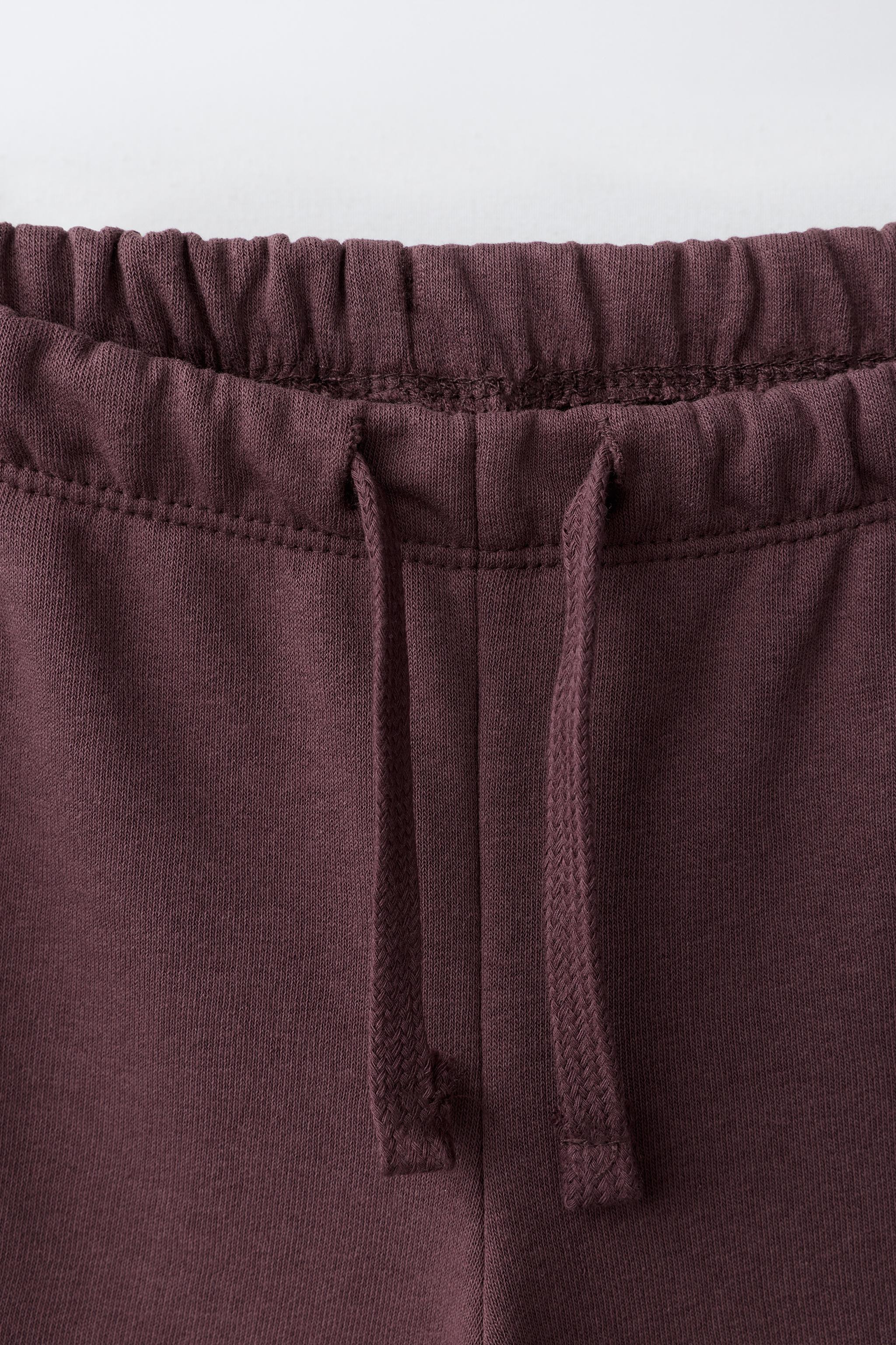 PANTALON WIDE LEG DÉCOR CLOUS