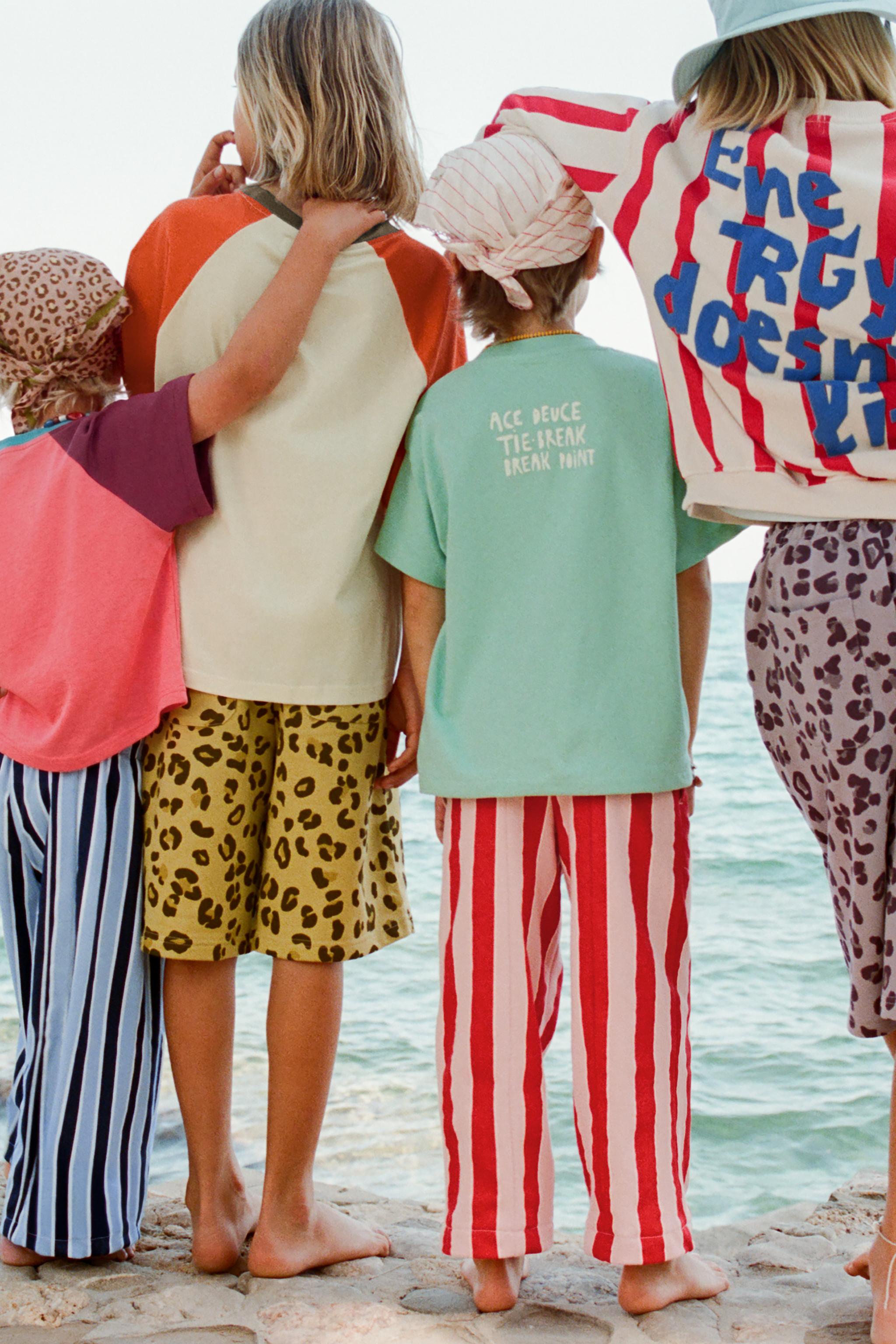 STRIPED SWEATSHIRT WITH RAISED TEXT