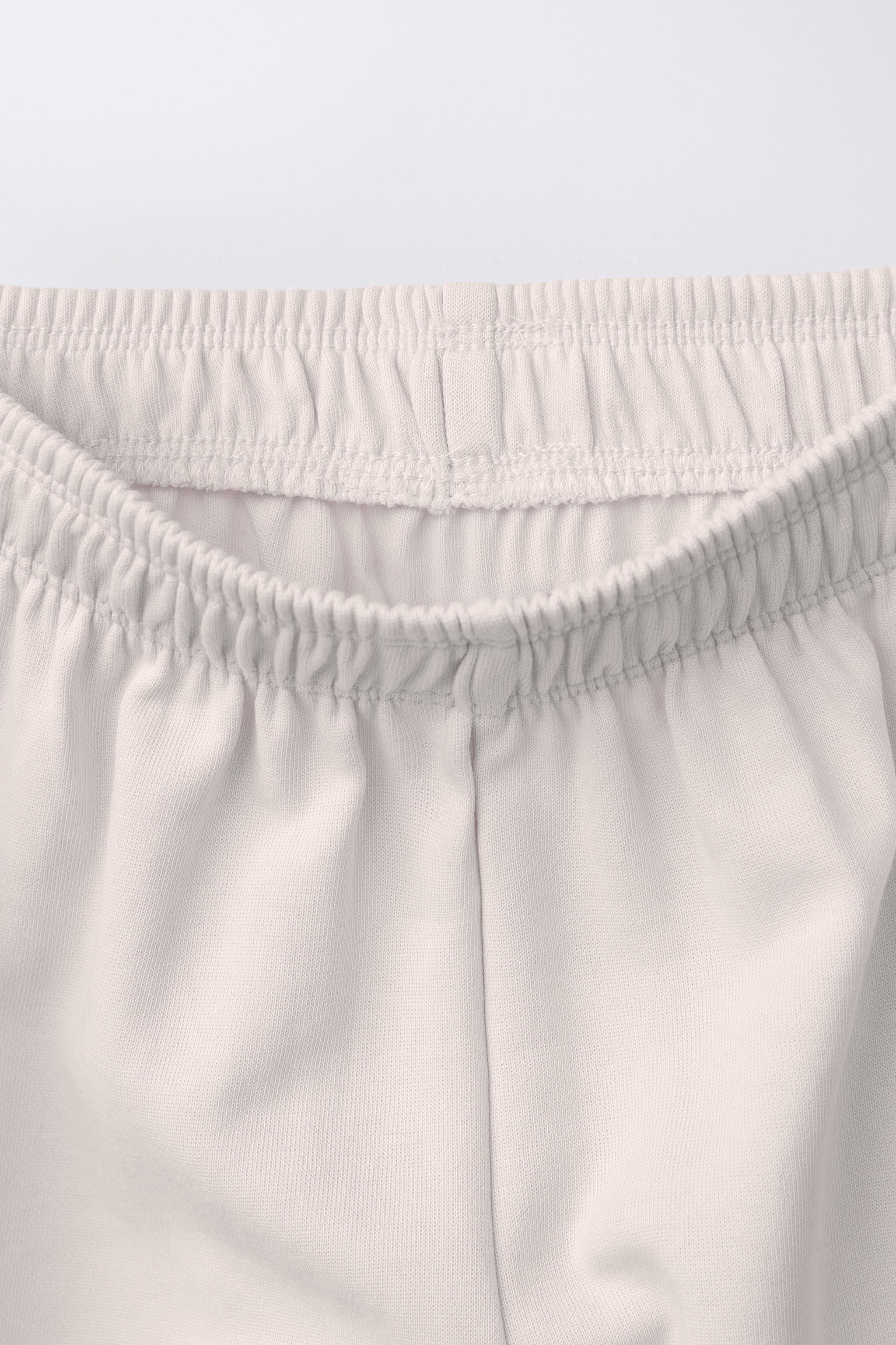 PANTALON À JAMBES LARGES INTERLOCK