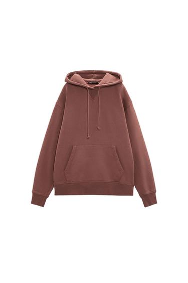 Brown hoodie with a kangaroo pouch pocket, adjustable drawstrings and elasticated cuffs, on a white background.