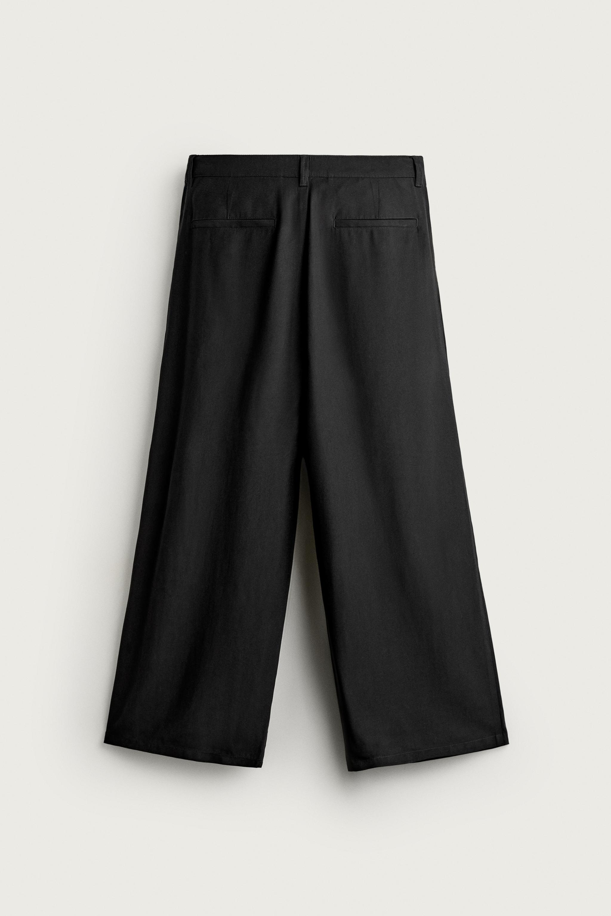 PLEATED FLUID TROUSERS
