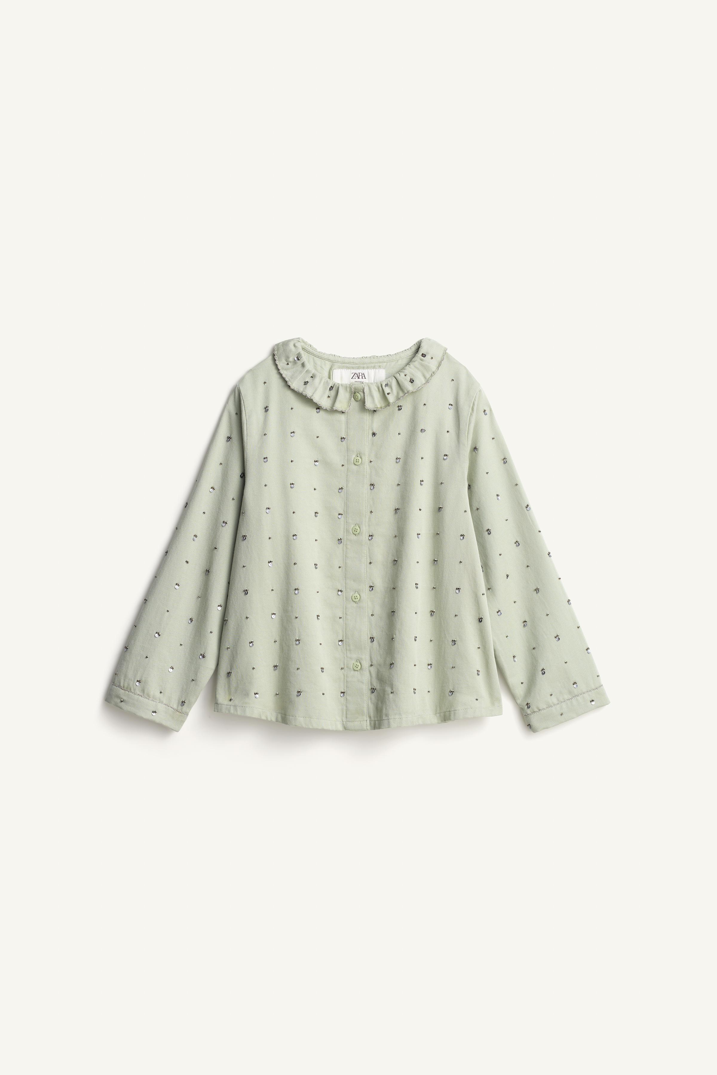 LIMITED EDITION SEQUIN RUFFLE NECK BLOUSE