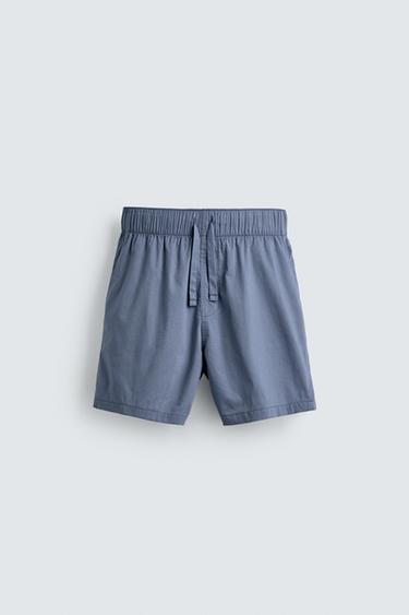 SET PIJAMA PANTALÓN CORTO AARON LEVINE X ZARA - Celeste de Zara