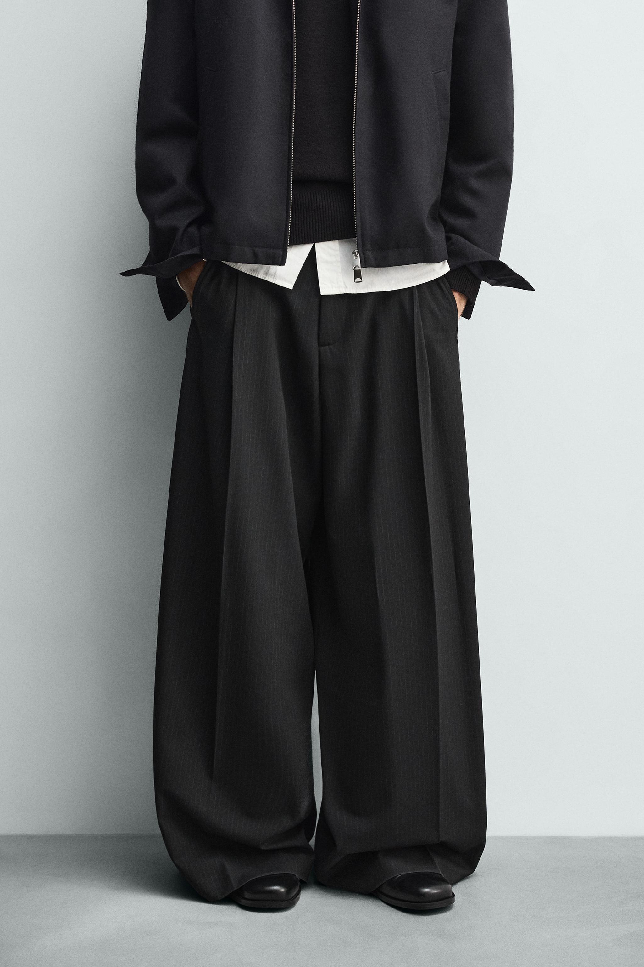 PLEATED WIDE FIT PANTS