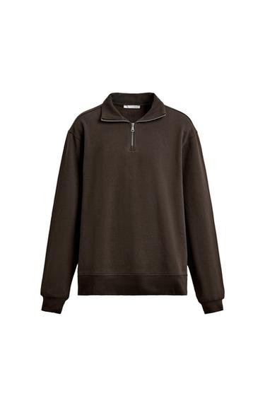 Front view of a brown sweatshirt with a zip-up neck and long sleeves.
