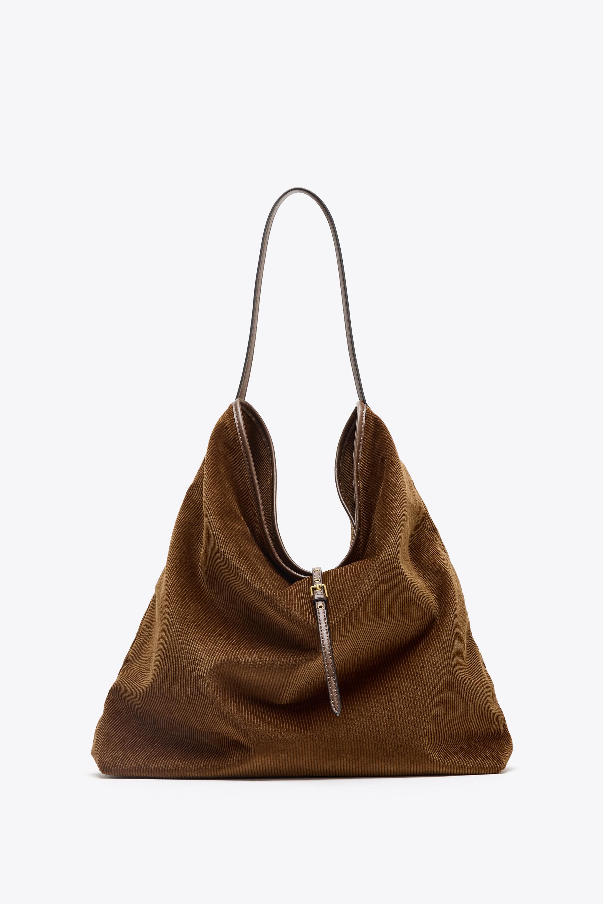 新品ZARA ダークブラウン スエード ショルダーバッグ ZARA】ブラウン スエード ショルダーバッグ 羽根モチーフ - メルカリ