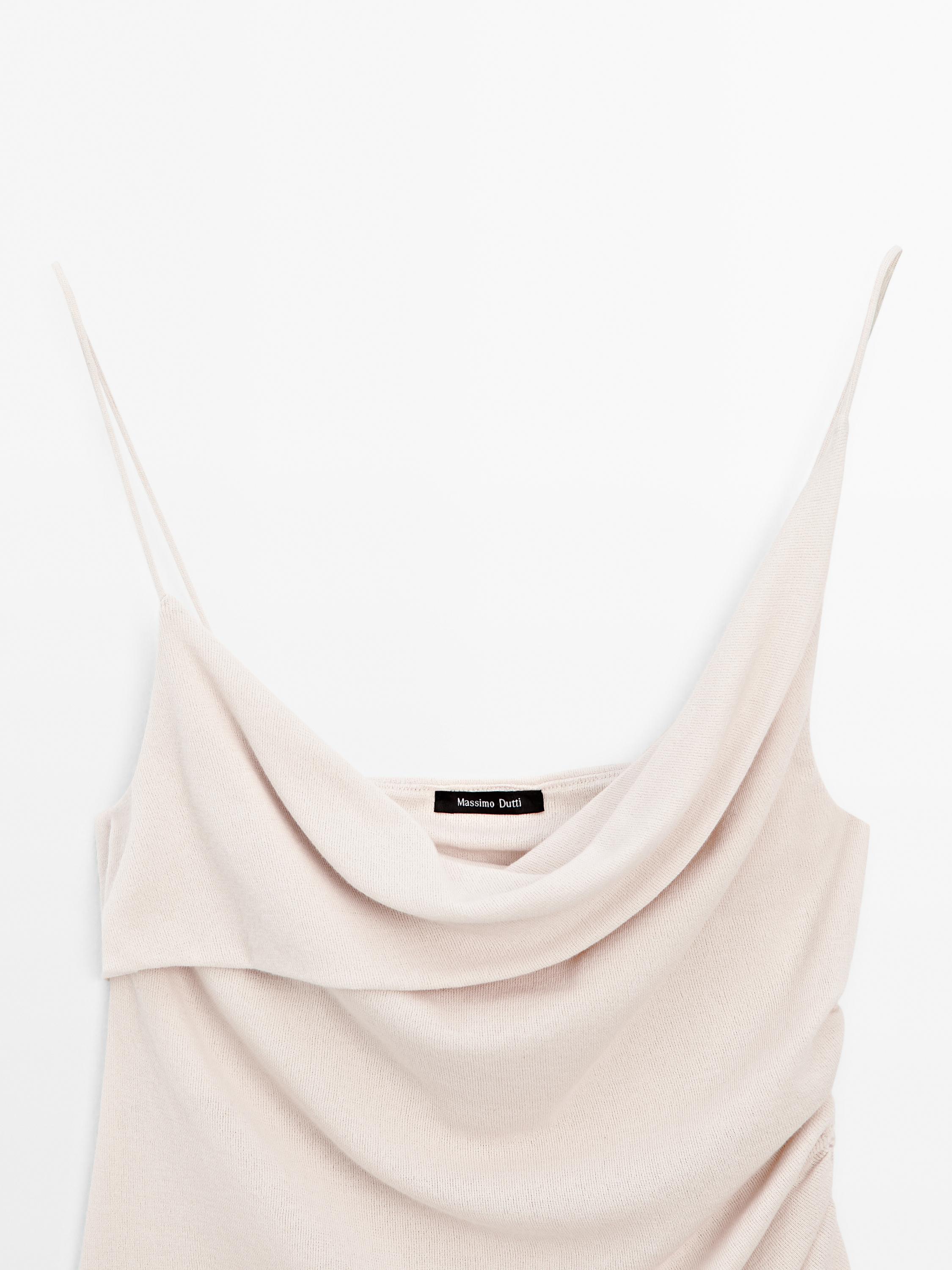 100% cotton top with asymmetric neckline