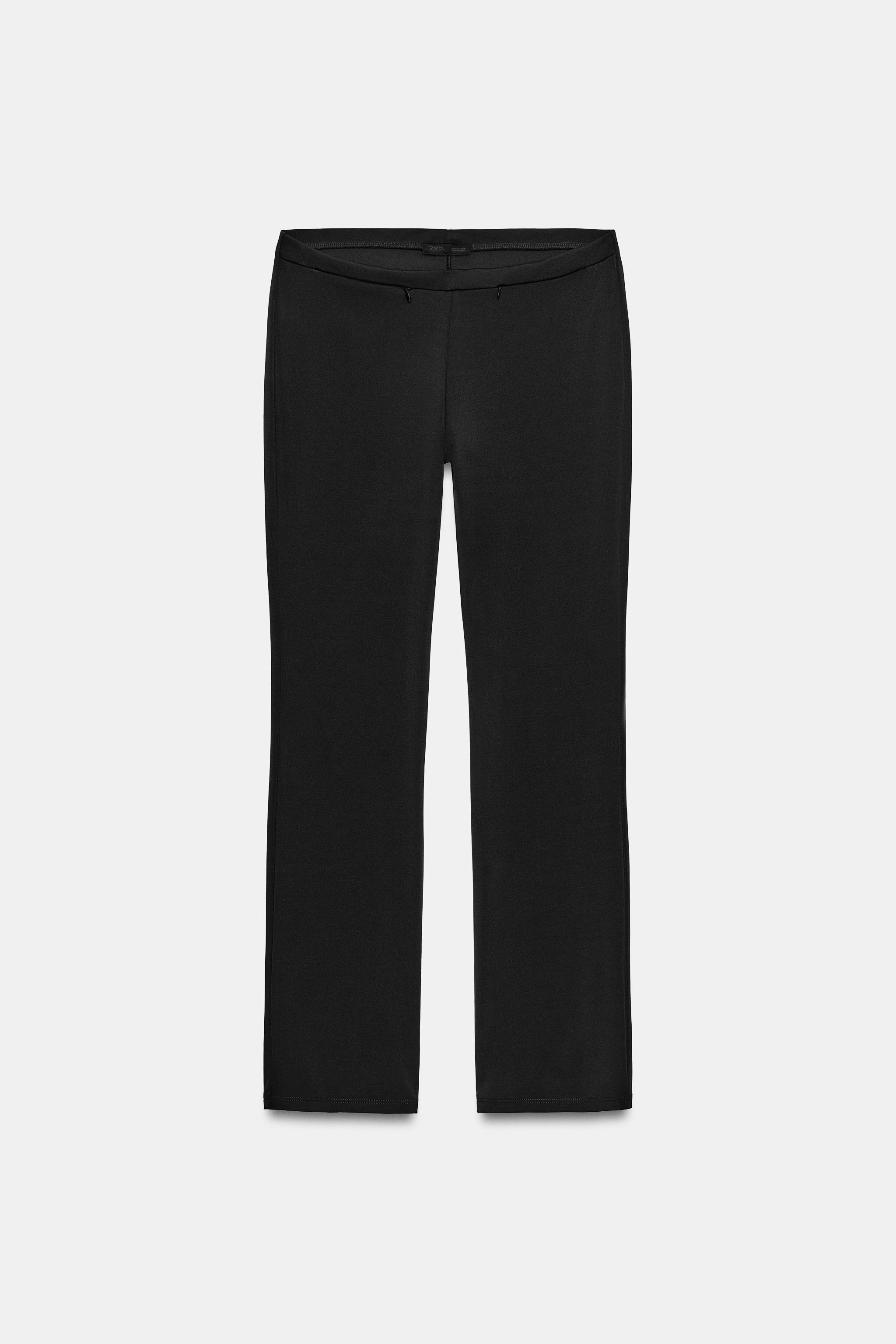 PANTALON À POCHES ZIPPÉES