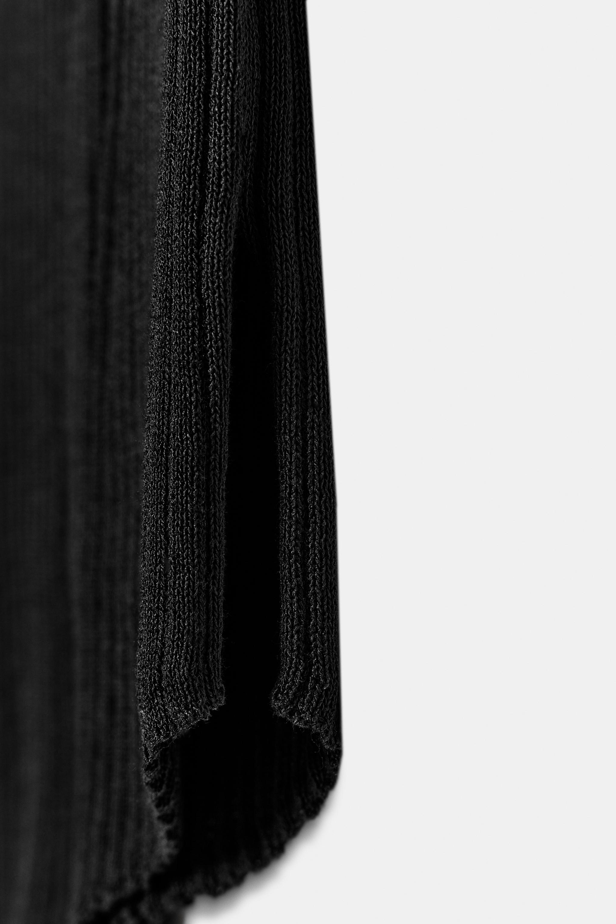 ASYMMETRIC RIB KNIT TOP