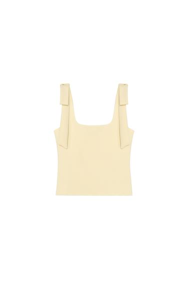 Front view of beige tank top with wide straps.