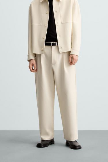 PANTALÓN RELAXED FIT PLIEGUES - Crudo de Zara