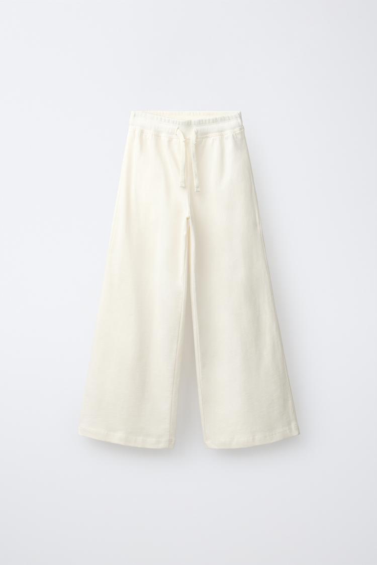 Pantalon wide leg pukas surf