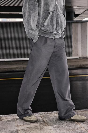 TROUSERS WITH PLEATS AND TWISTED SEAM - Grey by Zara