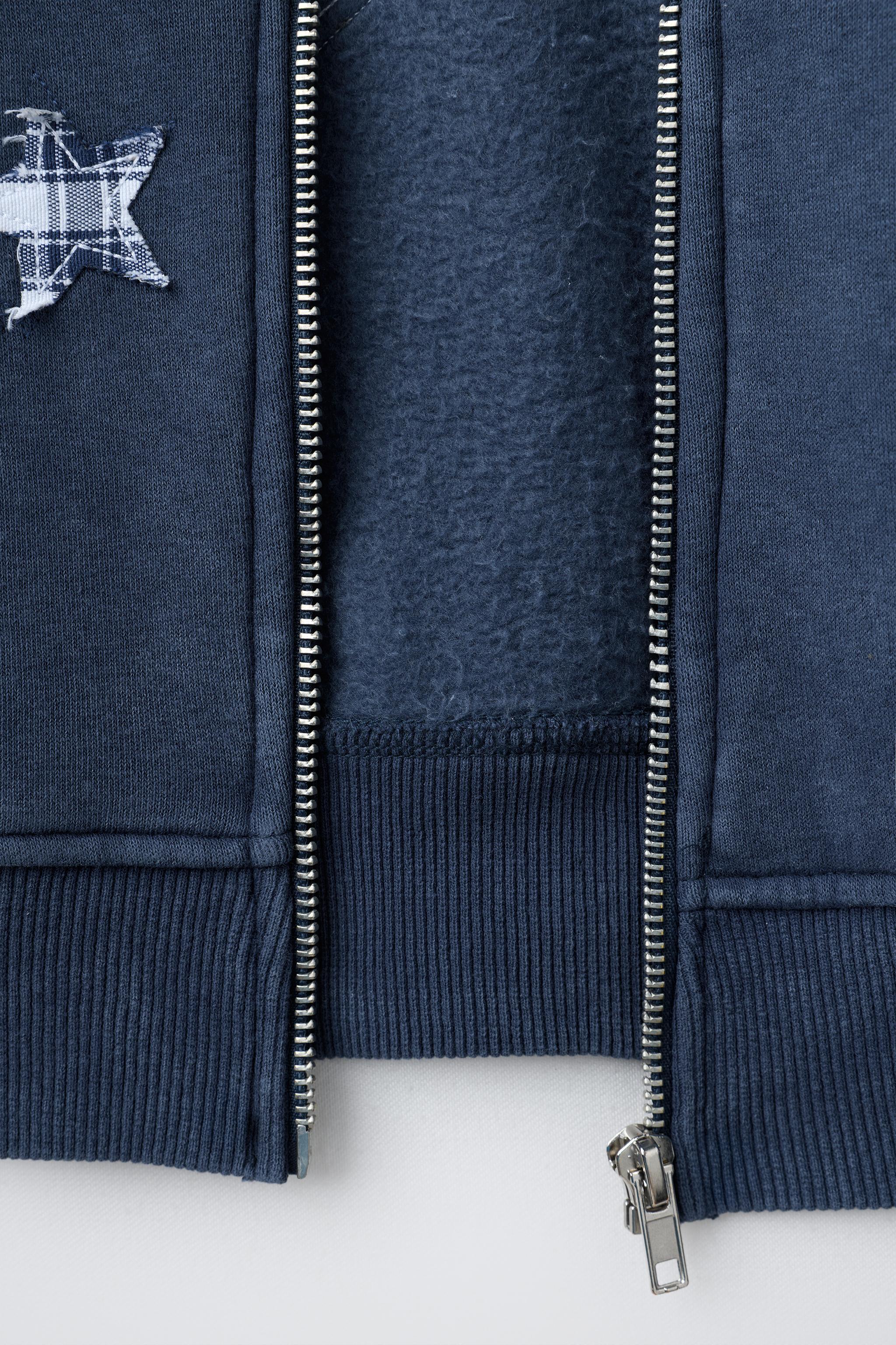 STAR PATCH ZIP-UP SWEATSHIRT