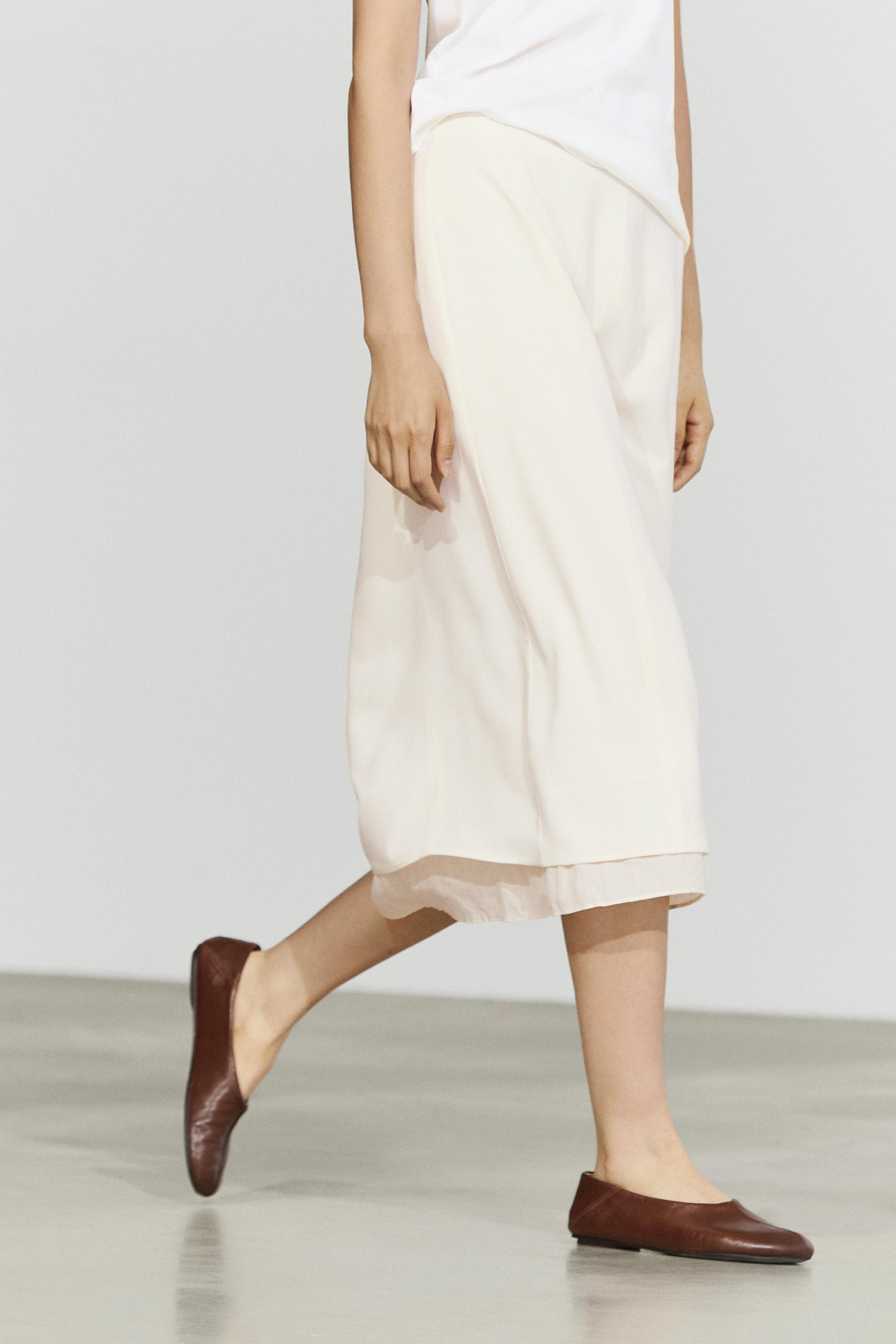 Double-layered midi skirt with seam detail