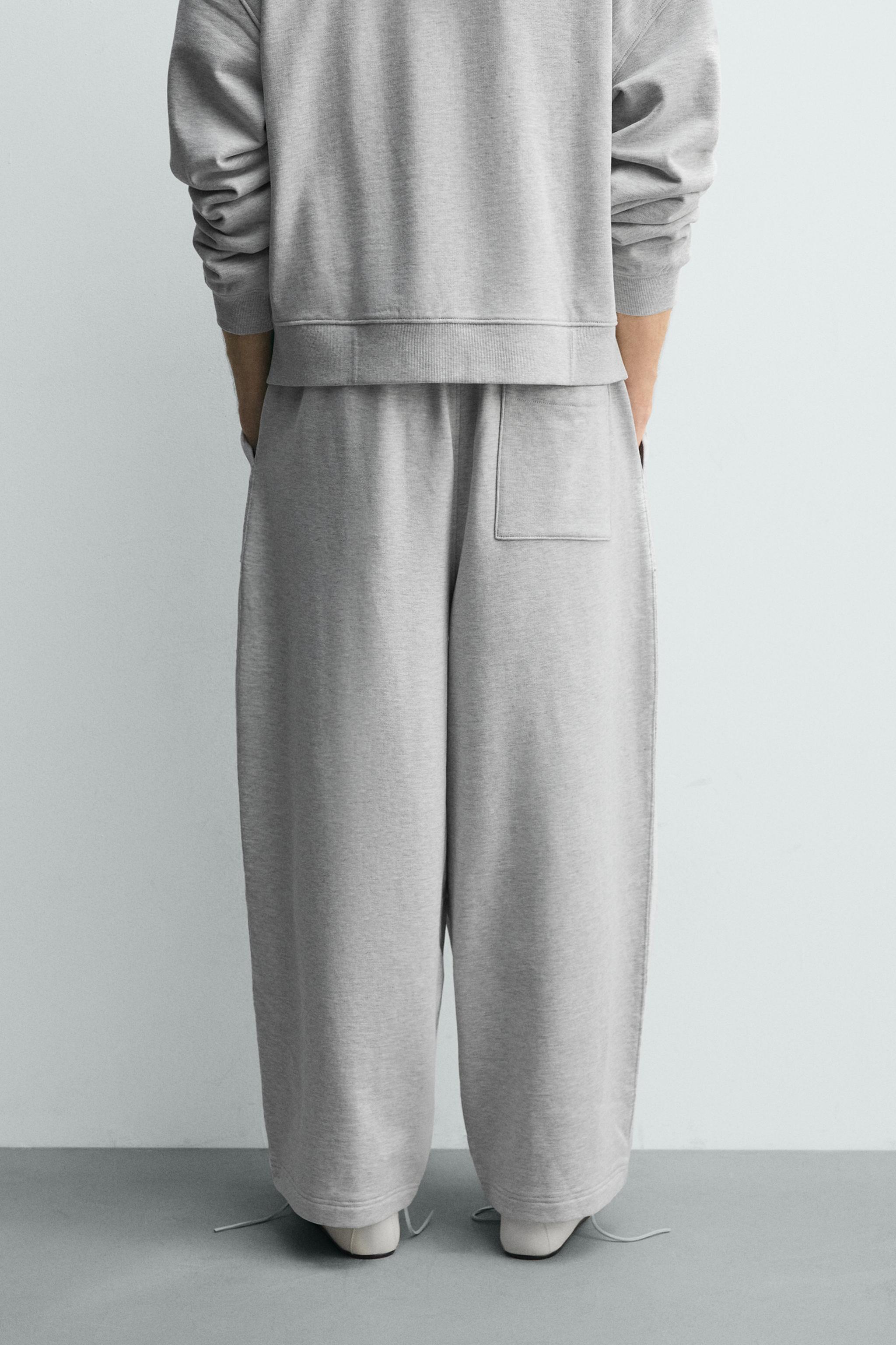PANTALON DE JOGGING COUPE BALLON AVEC PIÈCE