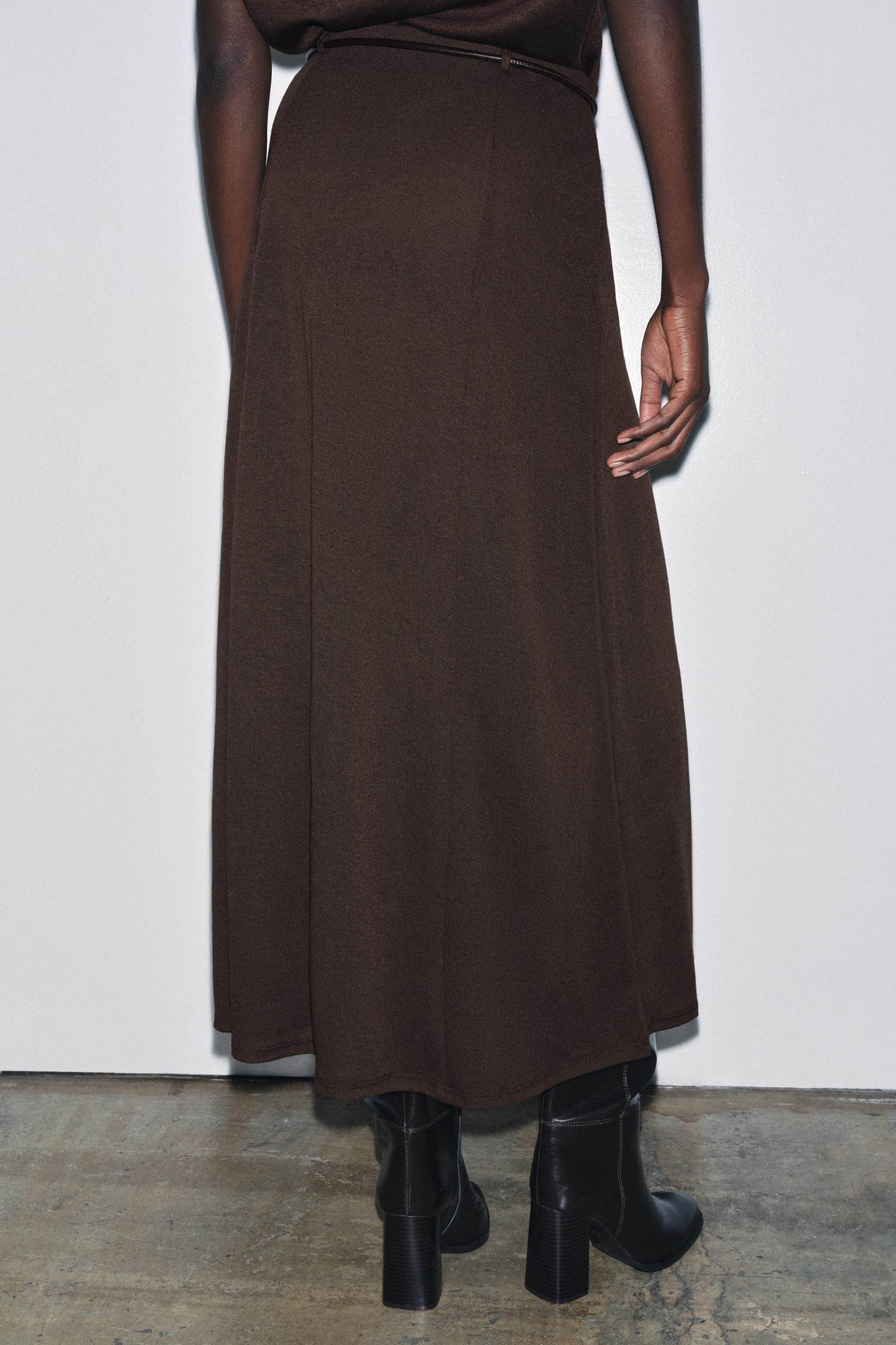 CUT-OUT KNIT SKIRT WITH BELT