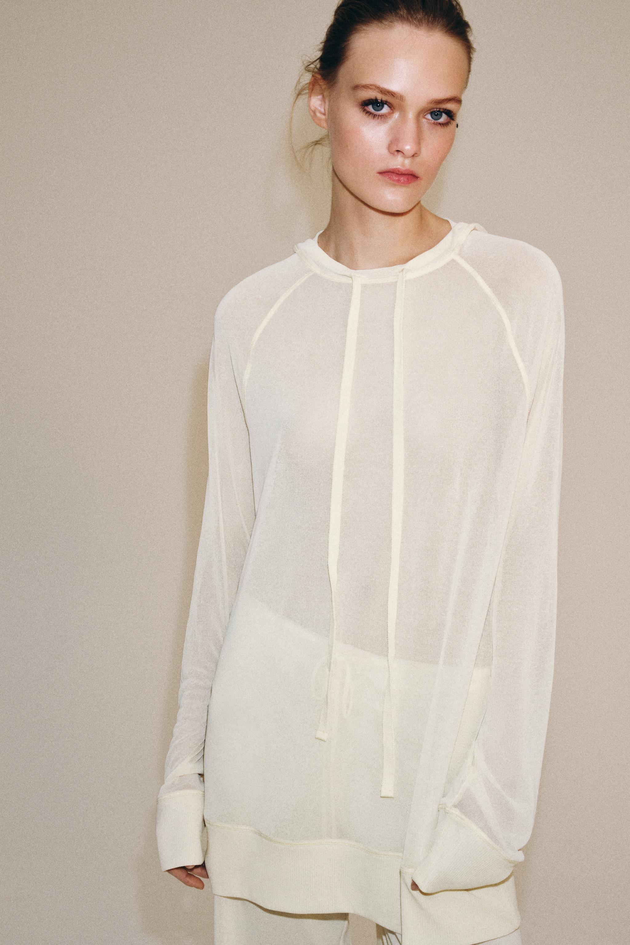 SEMI-SHEER FLOWY SWEATSHIRT