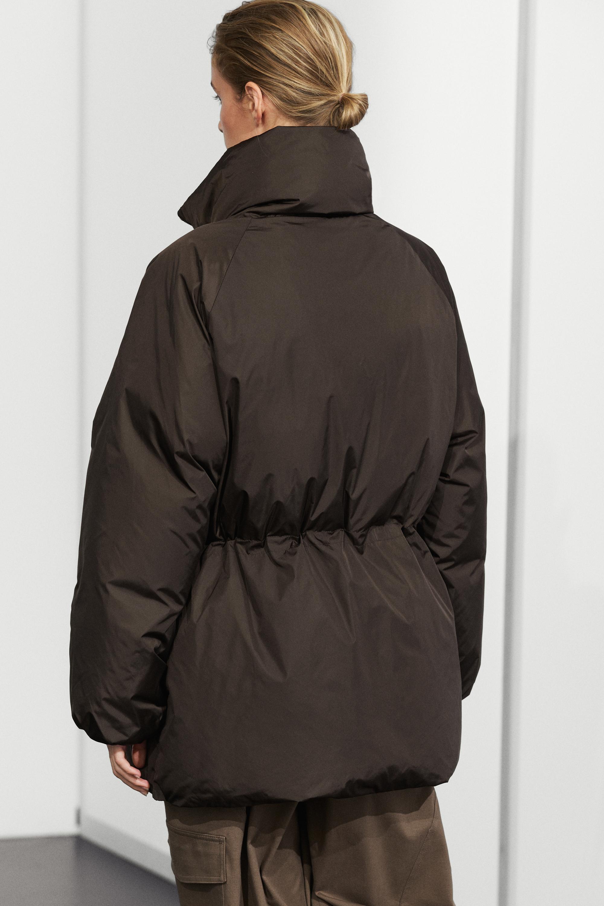 Down jacket with gathered detail