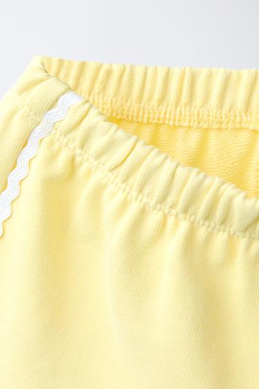 LOT DE DEUX SHORTS EN MOLLETON PARAPLUIES DE PLAGE ET ONDULINE - Imprimée de Zara - Image 3