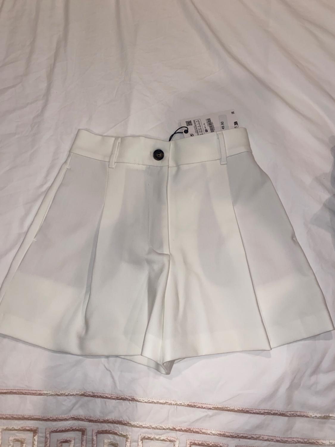 SHORTS TIRO ALTO PLIEGUES