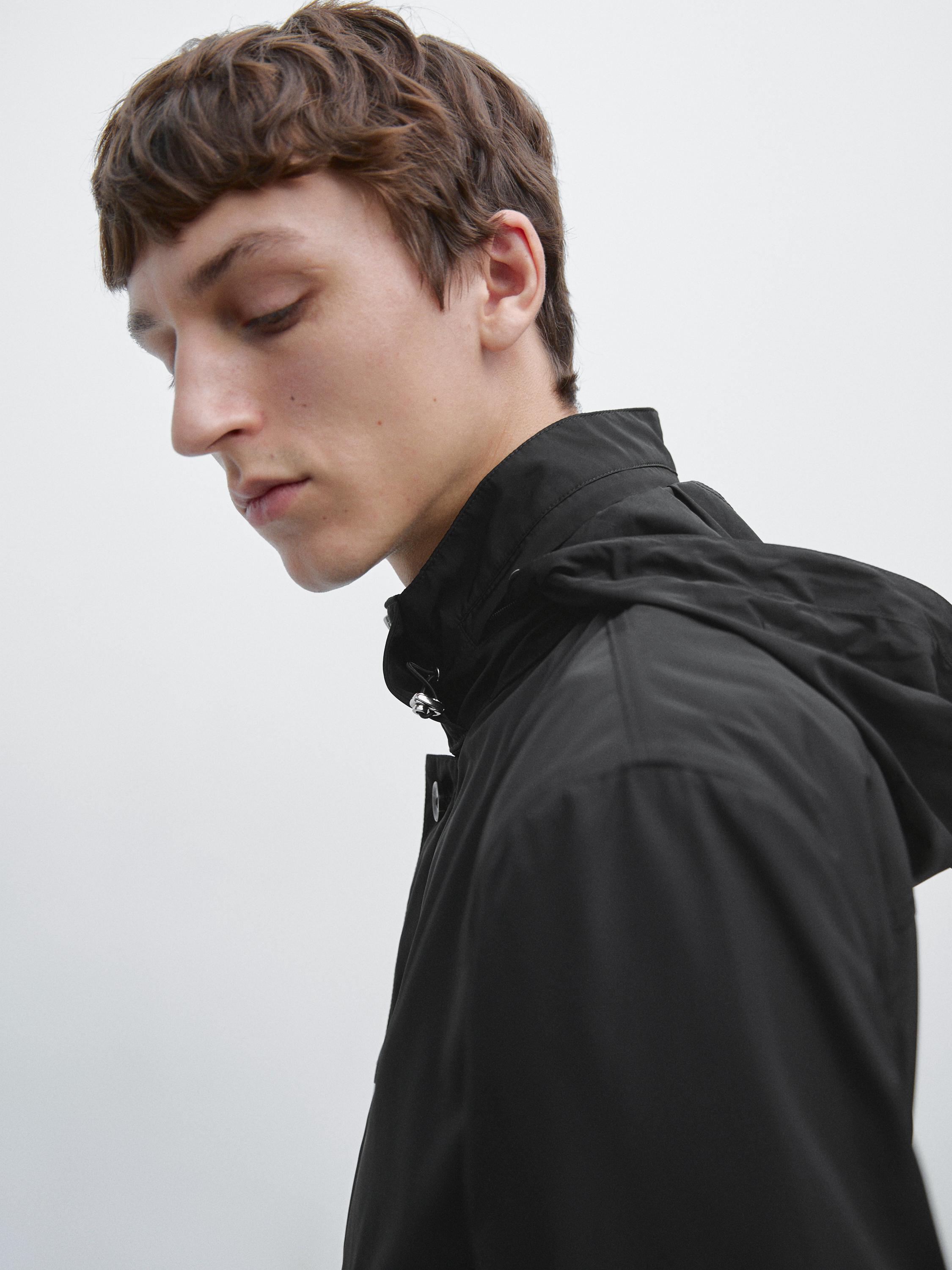 Hooded parka with fabric detail