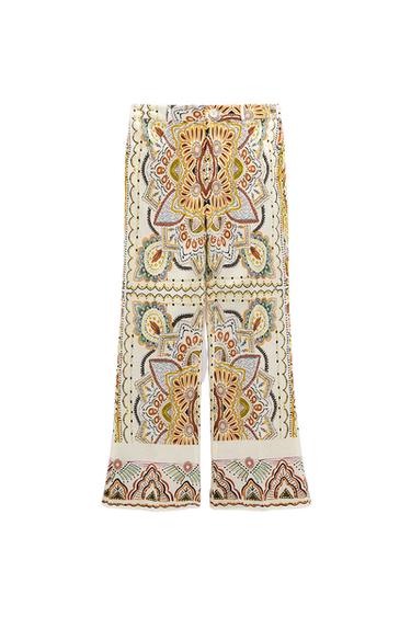 PRINTED FLARED PANTS